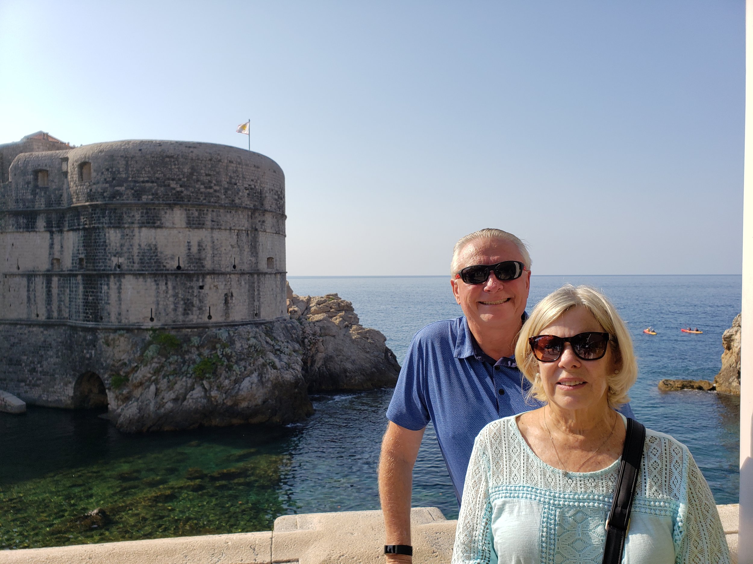  Blaine &amp; Jeri outside the walls of Dubrovnik with one of the ramparts in the background 