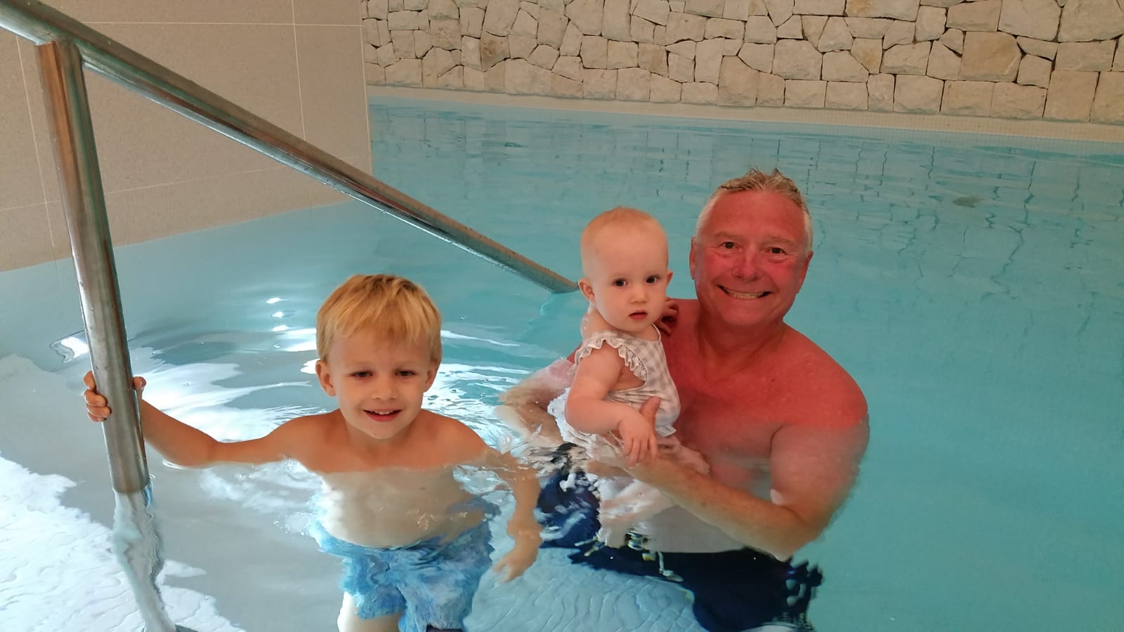  Blaine with Jude and Lila at the indoor pool. I wasn’t as red as the picture looks! 