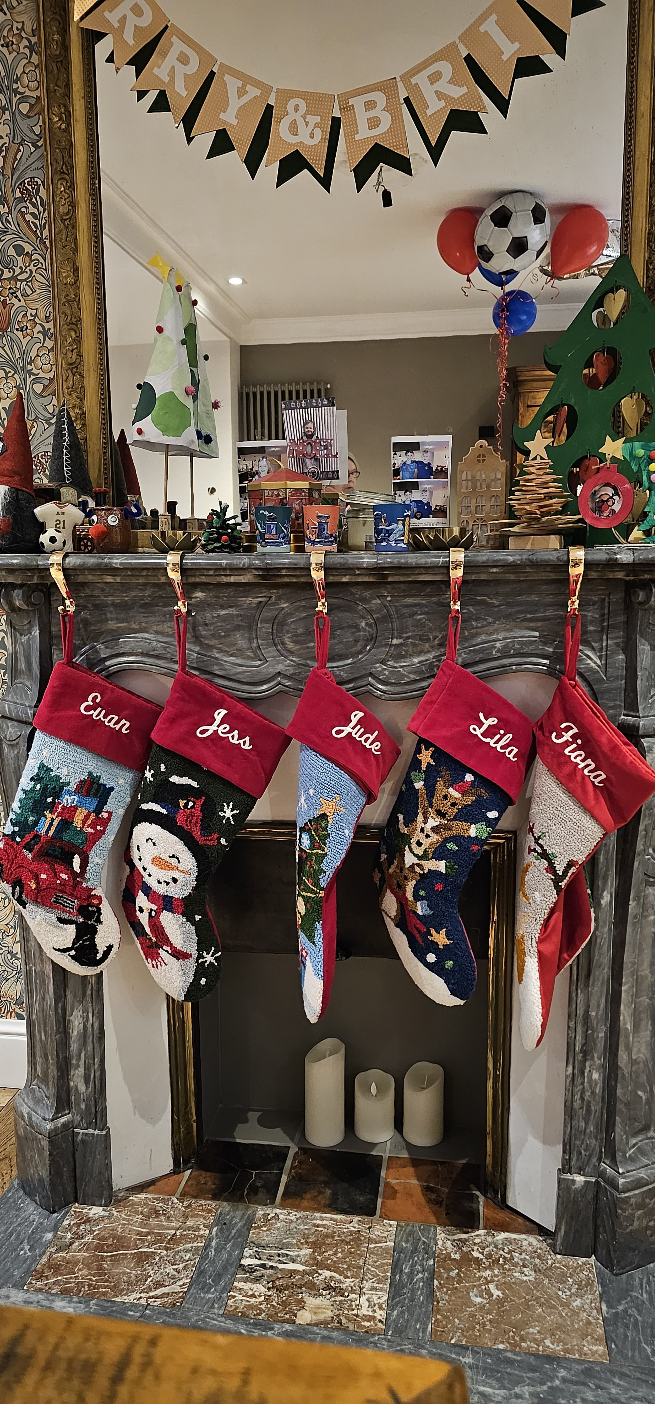 Christmas stockings hung over the fireplace