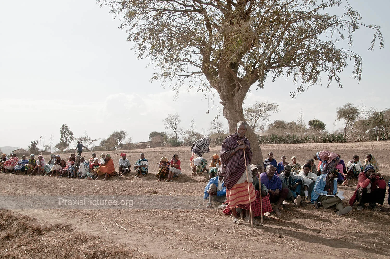 COMMUNITY OF NGORBOB - The community of Ngorbob gathers to explain their situation, surrounded by their now barren farmlands.