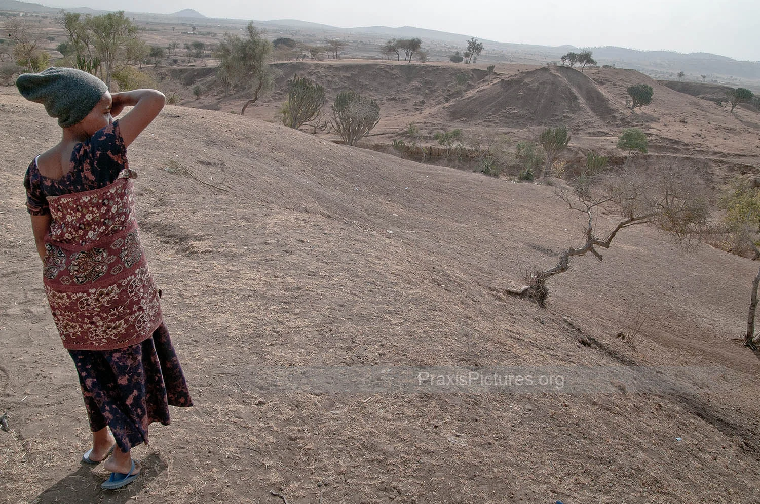 ARID LANDSCAPE - Zawadi looks out at the arid landscape surrounding Ngorbob.