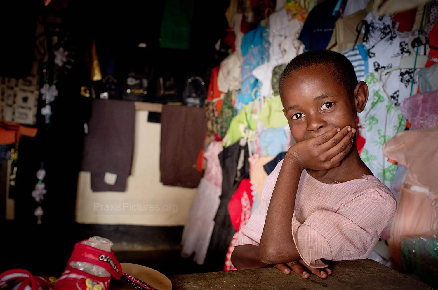 DEBORAH - Deborah's mother joined a VICOBA group in Mugusu in order to invest in her clothing shop. Because business has been going well for Deborah's mother, Deborah is now going to school and getting an education.