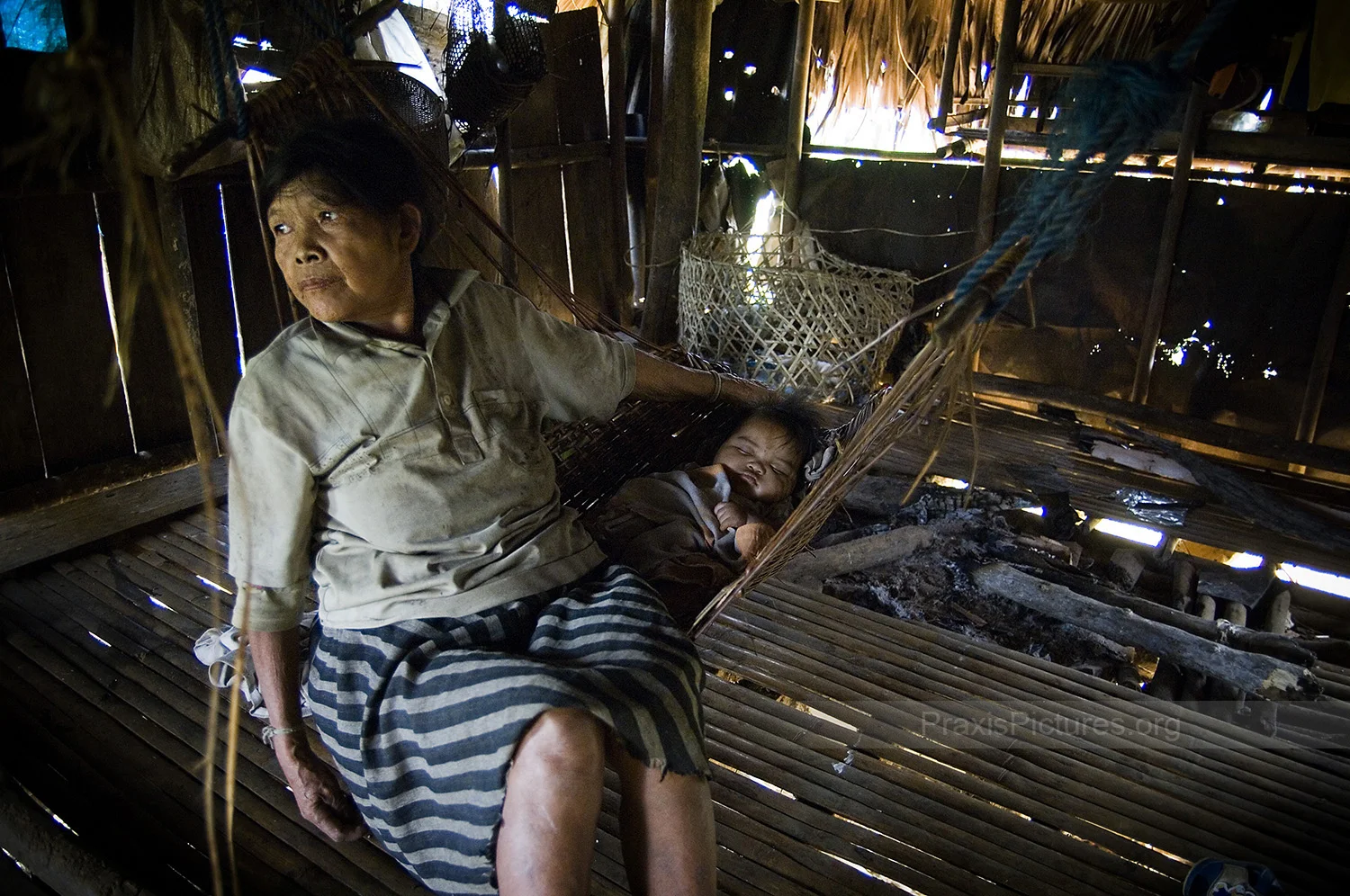 LUNINGNING - Luningning, of the Alangan tribe, with her granddaughter in the village of Kisluyan. The Alangan are one of 8 indigenous tribes in Mindoro, known collectively as the Mangyans. The Mangyans, who once occupied the whole island, are peacef…
