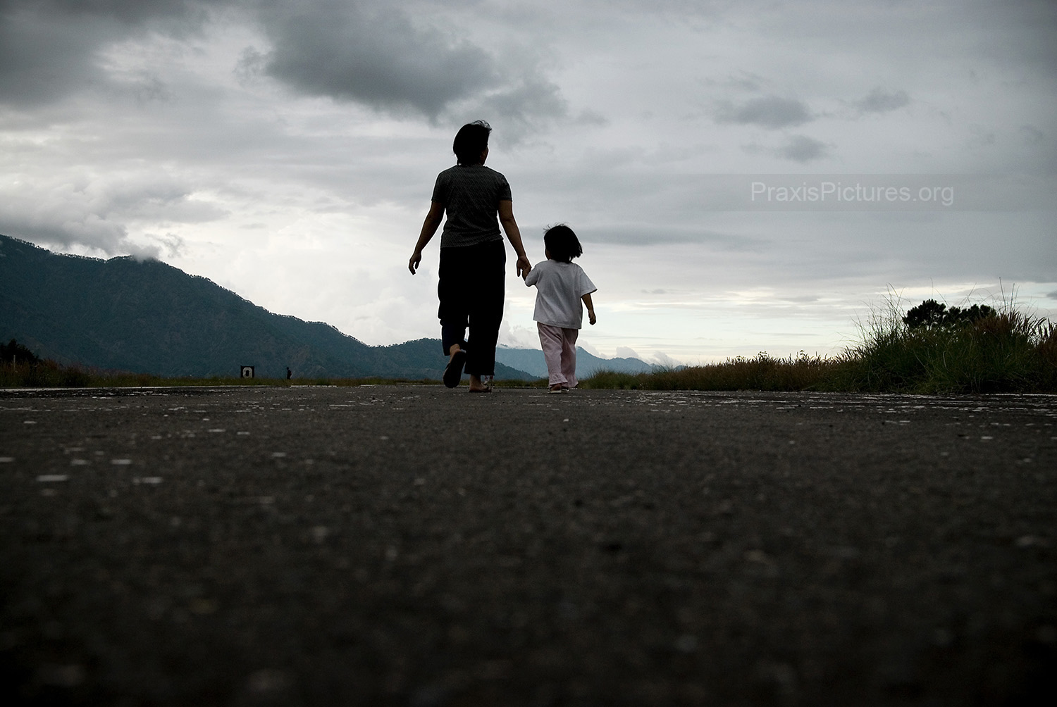 As the sun sets over the mountains of Benguet province, Lilia and Trixie walk along Lepantos airport runway near their home where all the gold is flown out of the province. The pattern has been repeated many times across the Philippines; the companies come in promising to bring with them jobs, development and prosperity. In reality, the experiences of the people of the Philippines show that large-scale corporate mining destroys, pollutes, and disrupts agricultural economies, and displaces indigenous peoples. While the mines do generate a great deal of wealth, local communities rarely see any of it. The global demand for these metals have been skyrocketing, and the mining industry is booming. Yet, in places like the Philippines where these metals are found, the effects will be felt for generations. Families are being torn apart, indigenous cultures are being eroded, livelihoods lost, and ecosystems destroyed – all for someone elses treasure.