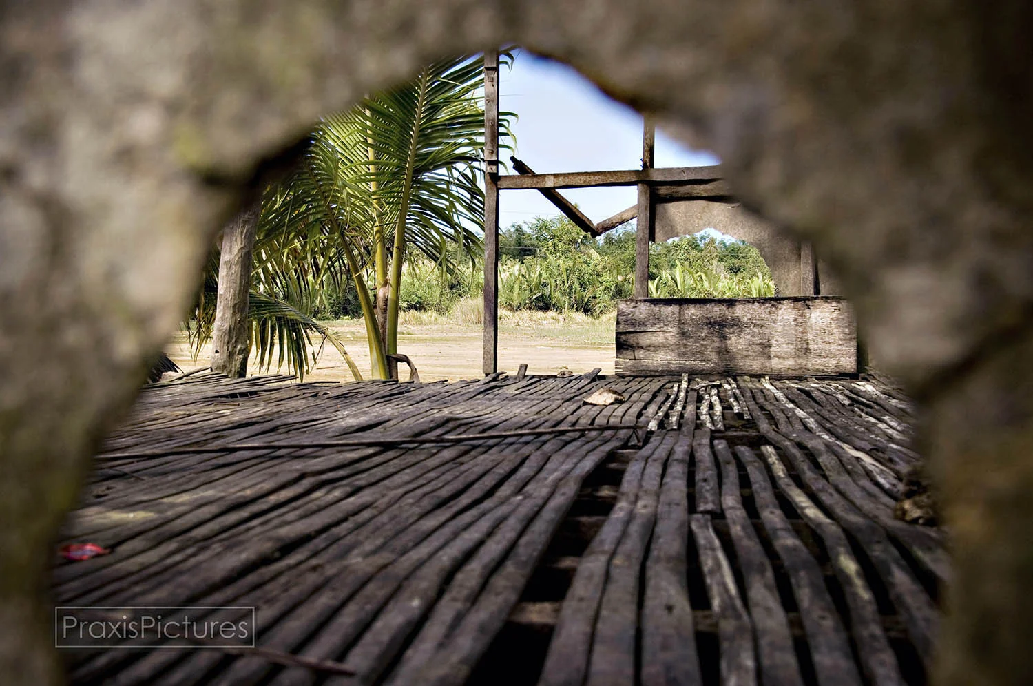 A closer look, through a hole in the wall, at this abandoned farm. No one knew for sure what has happened to the family that once lived there.