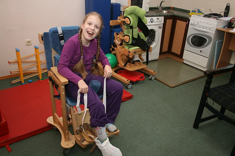 Nastya can now put on her socks with the help of an assistive device