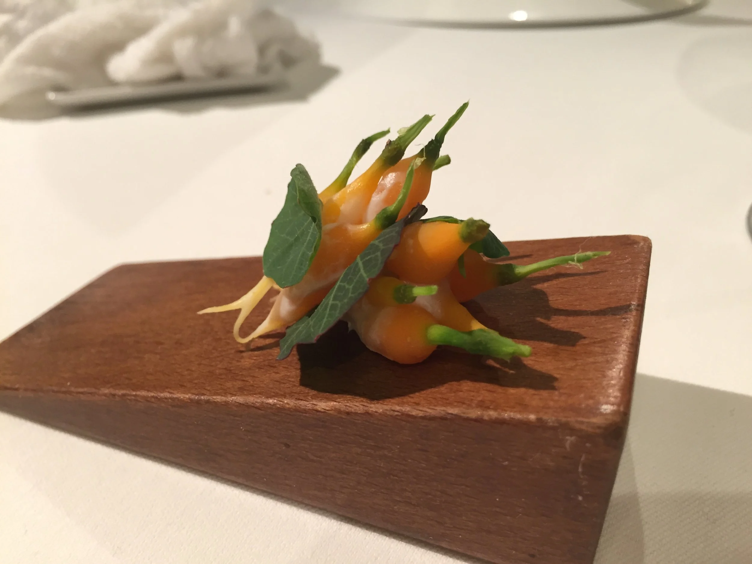 A handful of coated carrots.