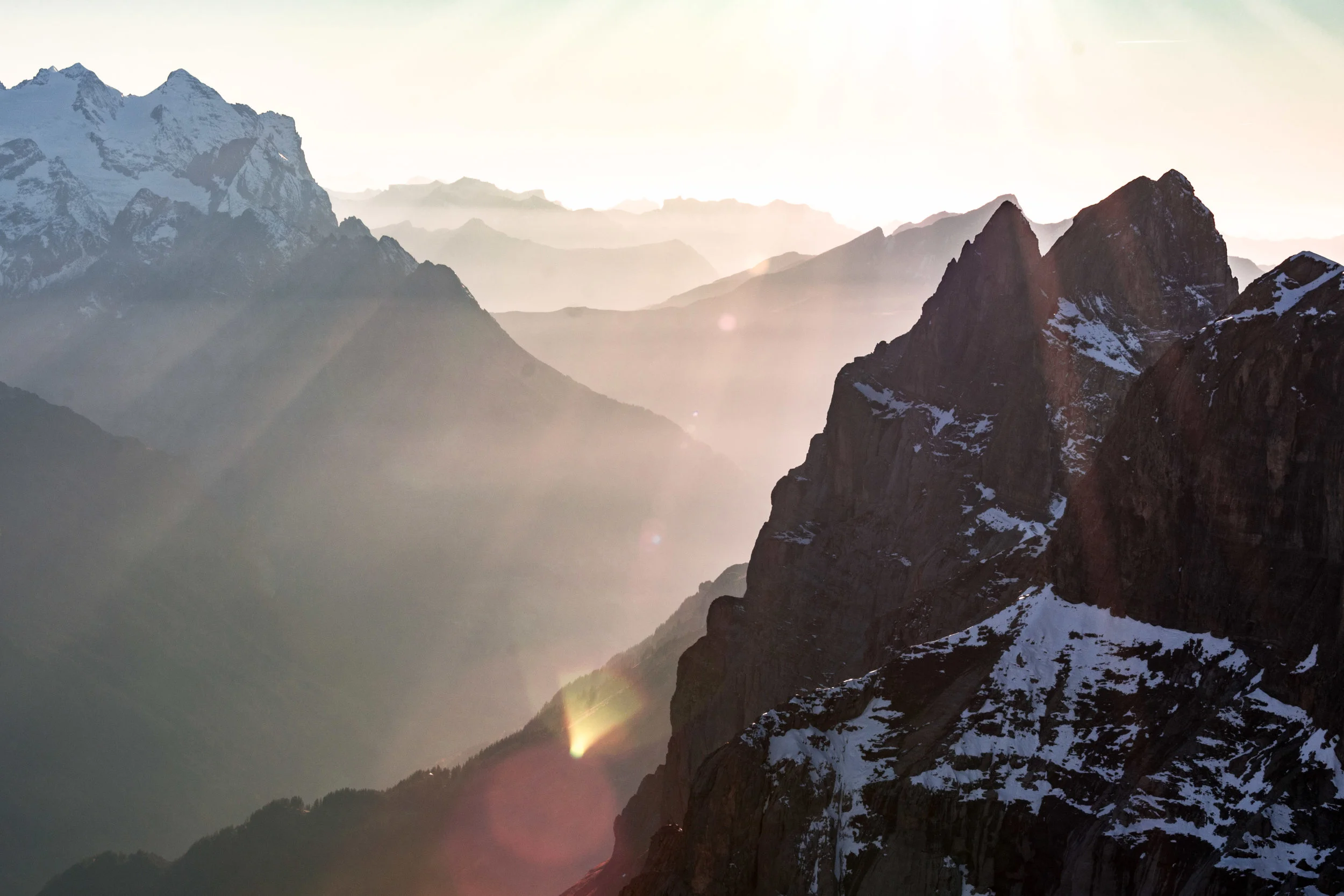Light rays streaming through the Alps in Engelberg.