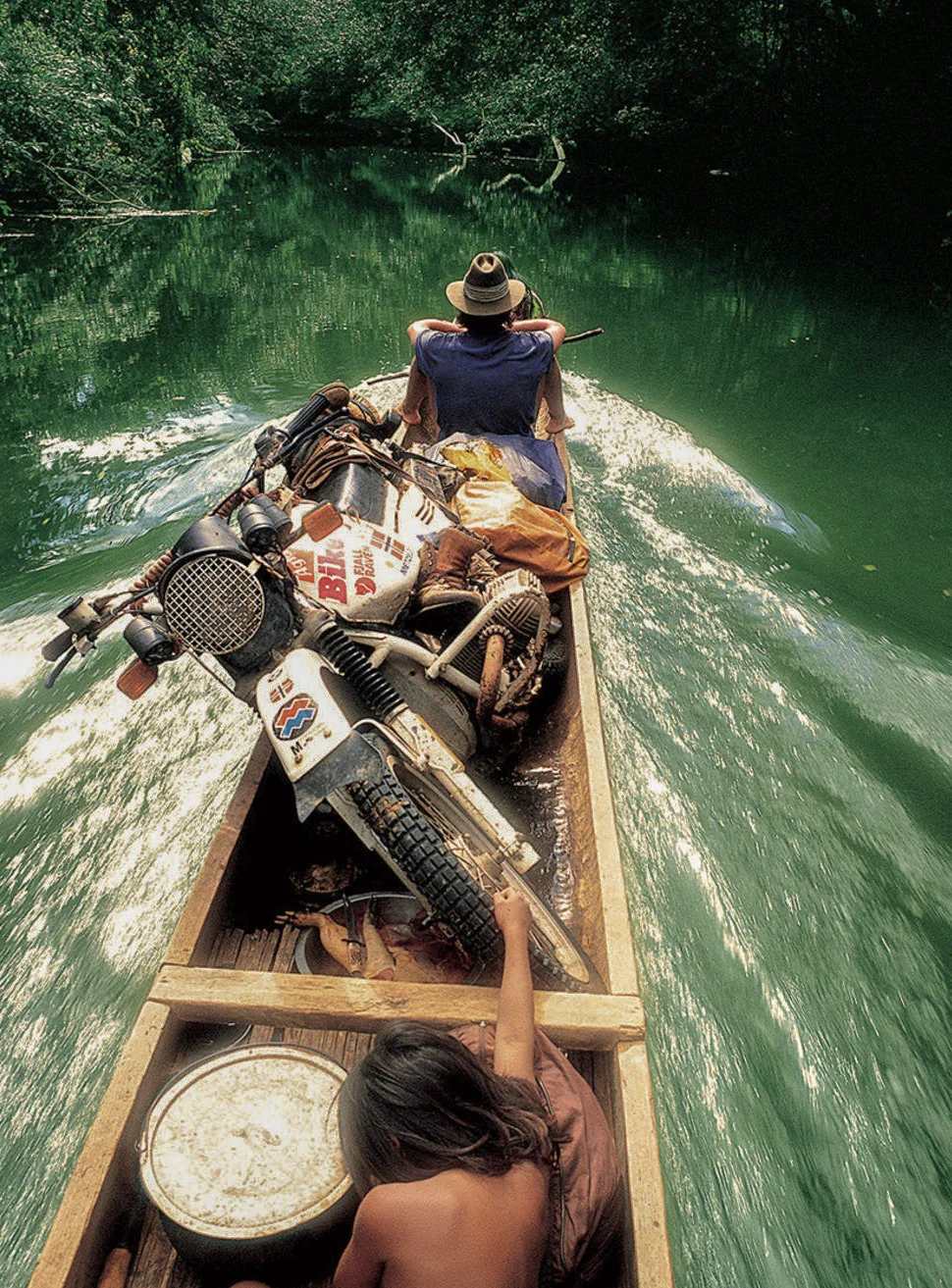 Helge g oing upriver on the Amazonas on a small motorized canoe, tipping is not an option. ( ©Helge Pedersen)