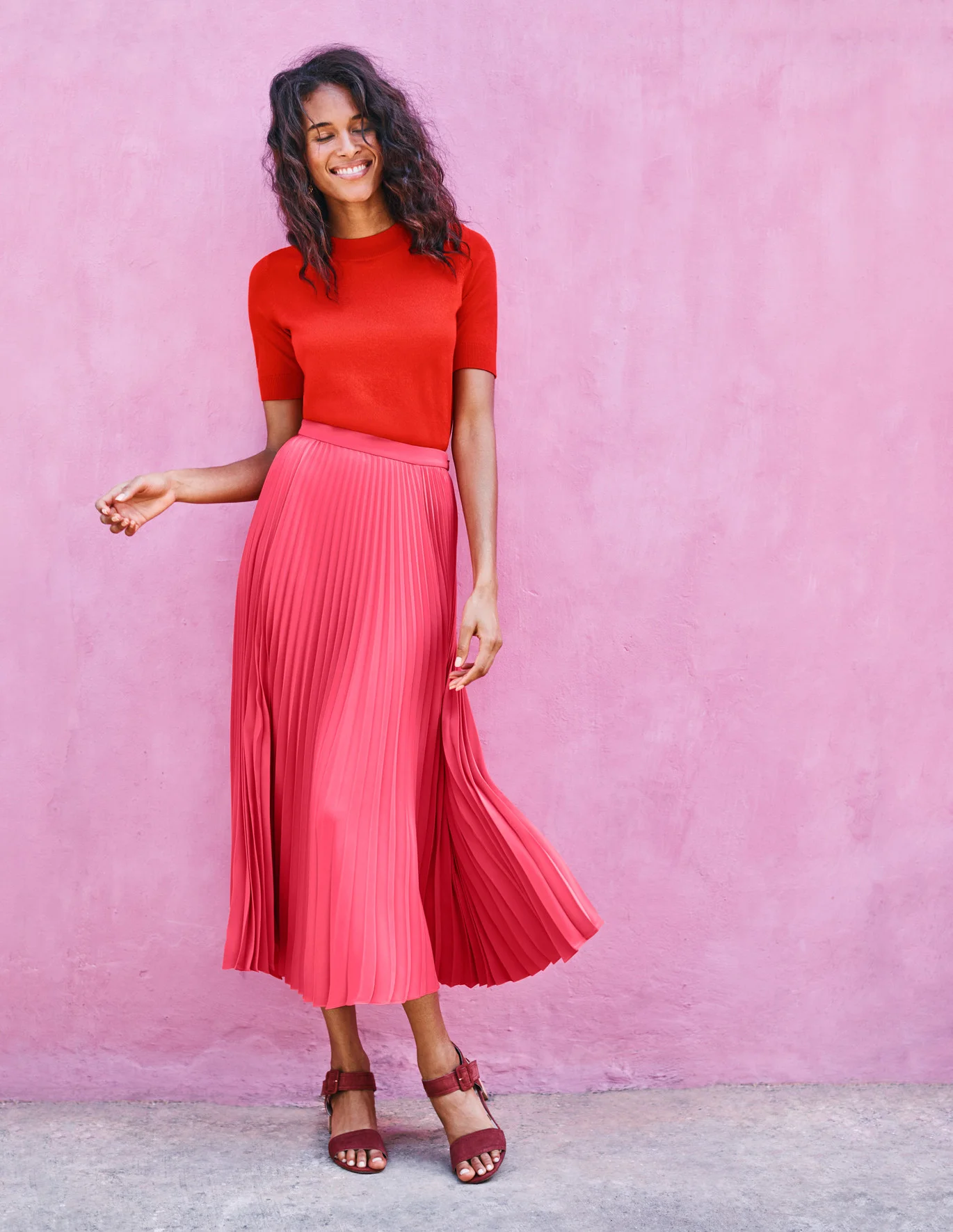 Boden Pleated Skirt The red/pink color combo is VERY on trend. Don’t fear looking like a Valentine’s Day card. It super “in” and tres chic!