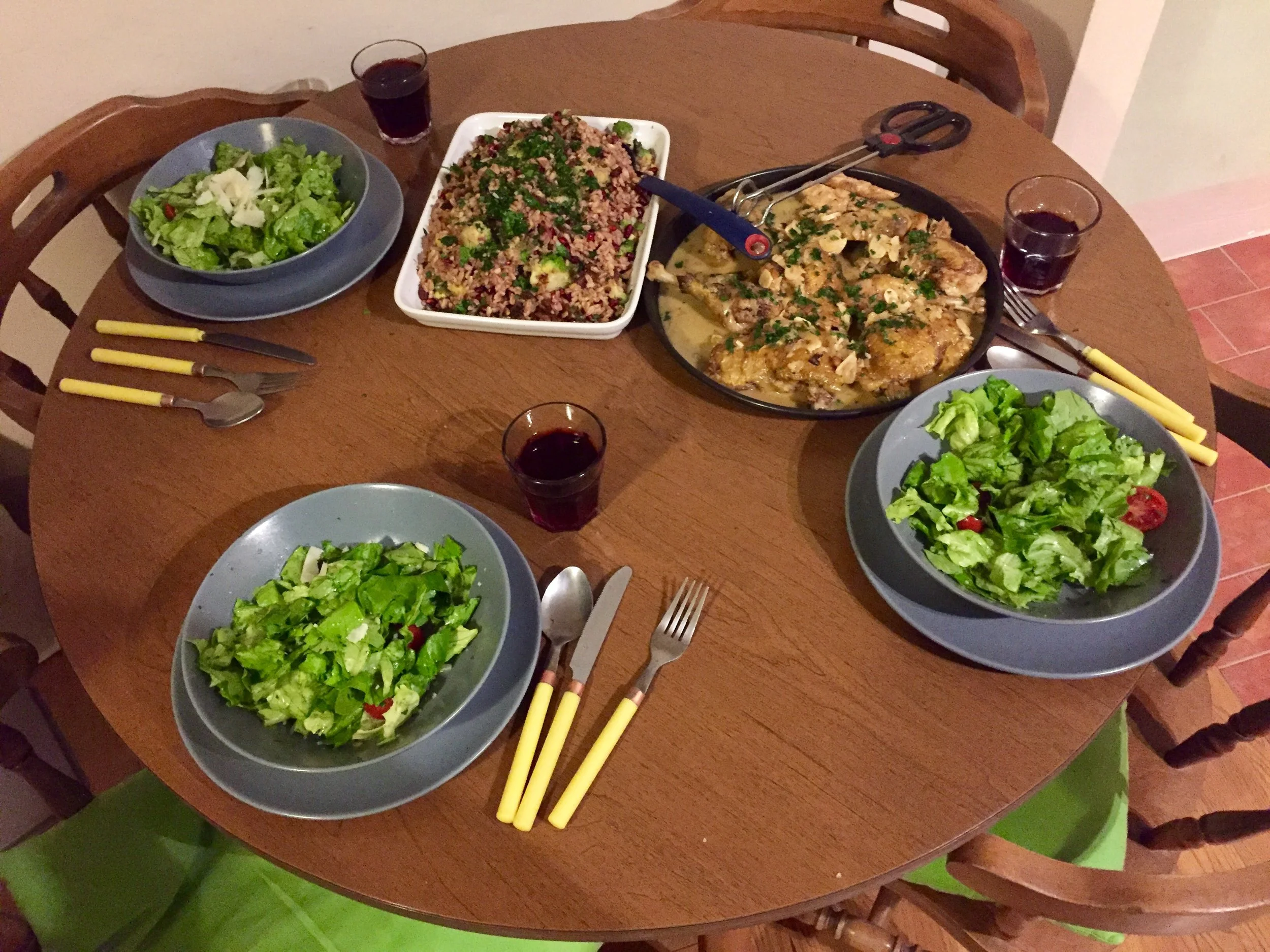 Home cooked Tuscan meal. Notice the fancy wine glasses and cutlery!