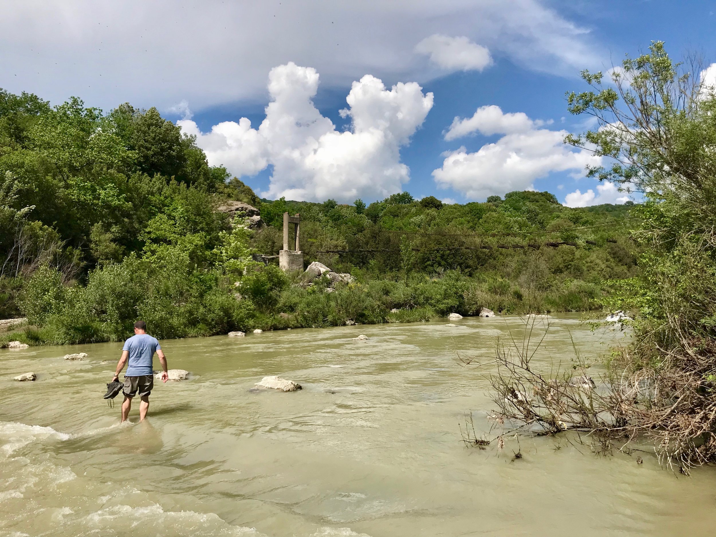 Inching my way across the ford in the Orcia river