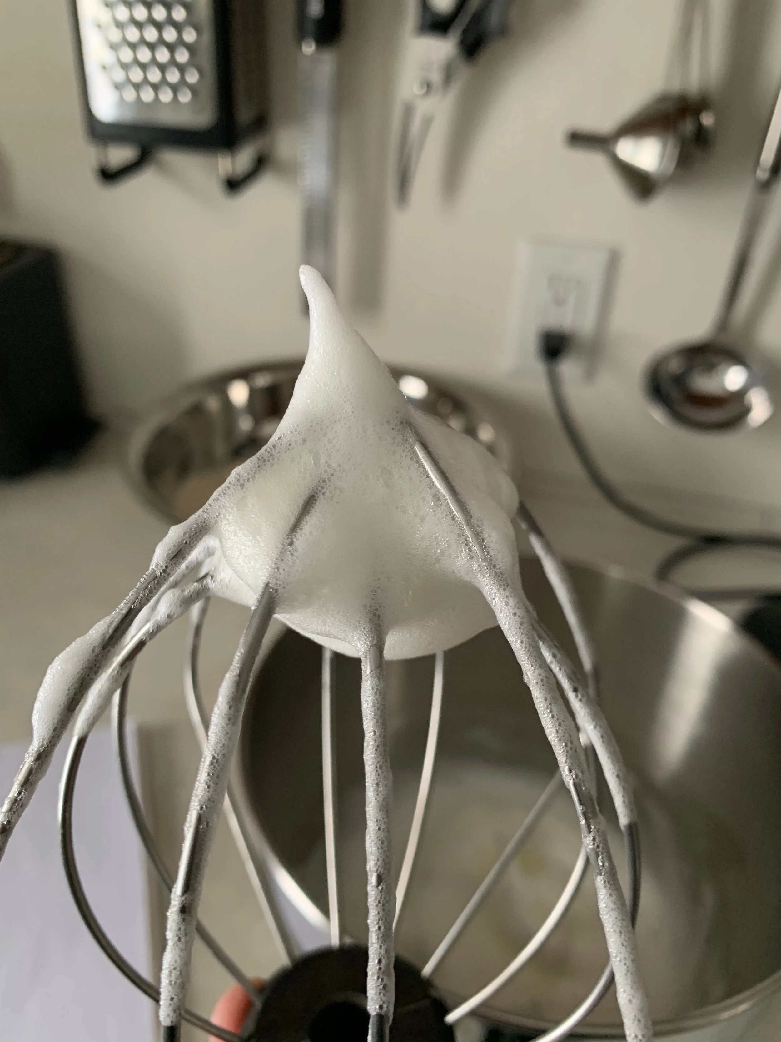 Egg whites beaten to soft peaks