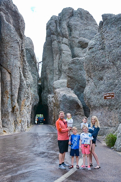 family at Needles Eye Tunnel Custer State Park.jpg