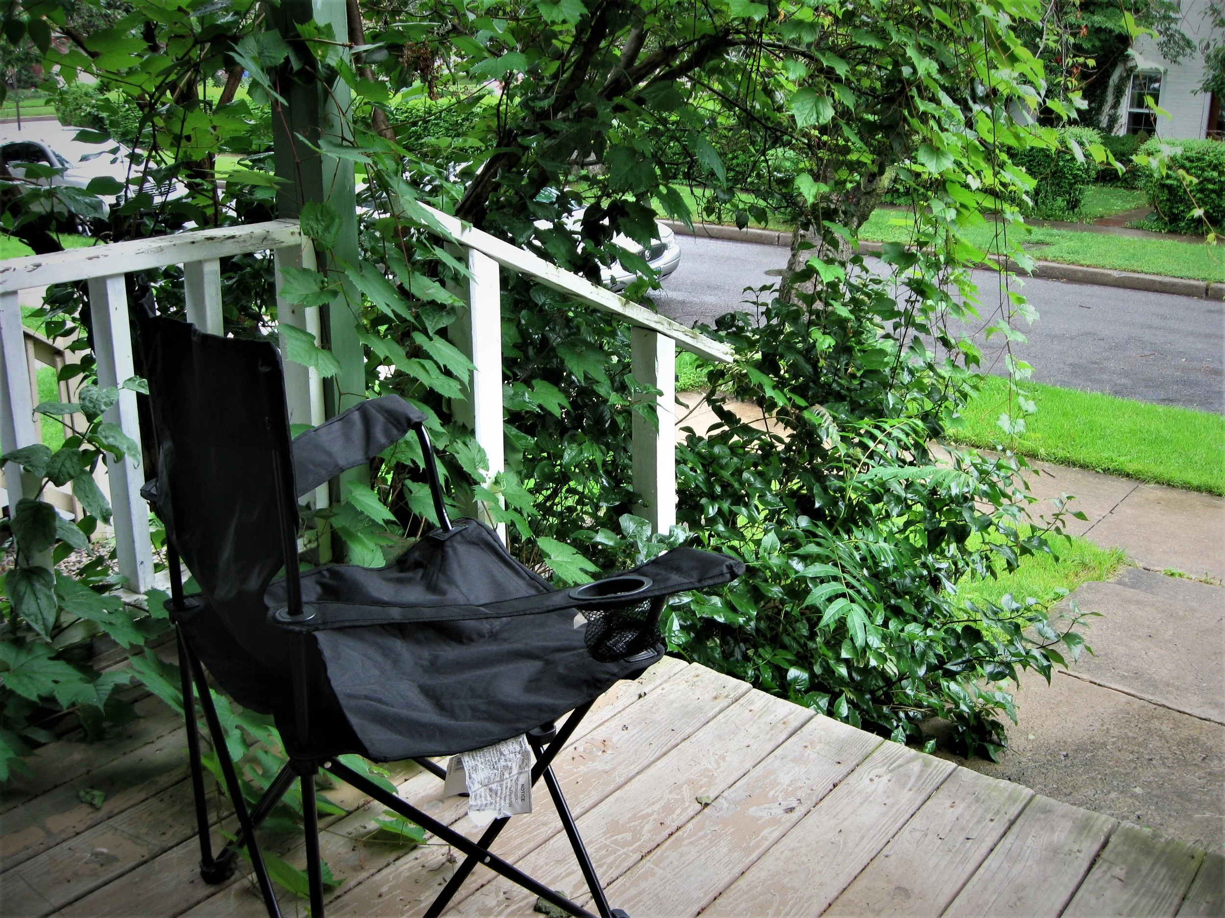 The most rudimentary porch scene ever posted on a blog. Nary a twinkle light in sight.
