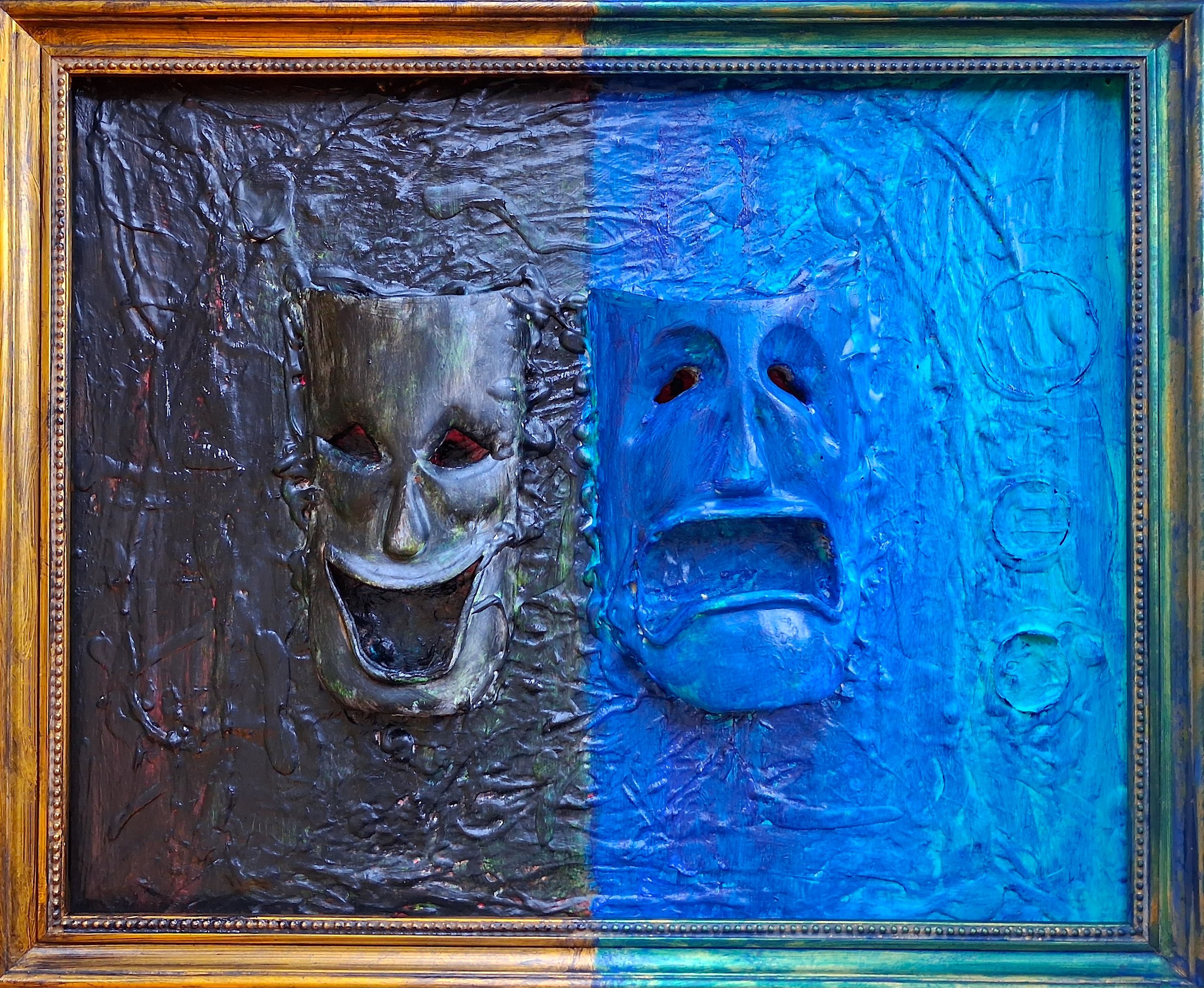 Black and Blue, 2019. Oil, acrylic, wooden masks on canvas and frame. 24” x 20”.