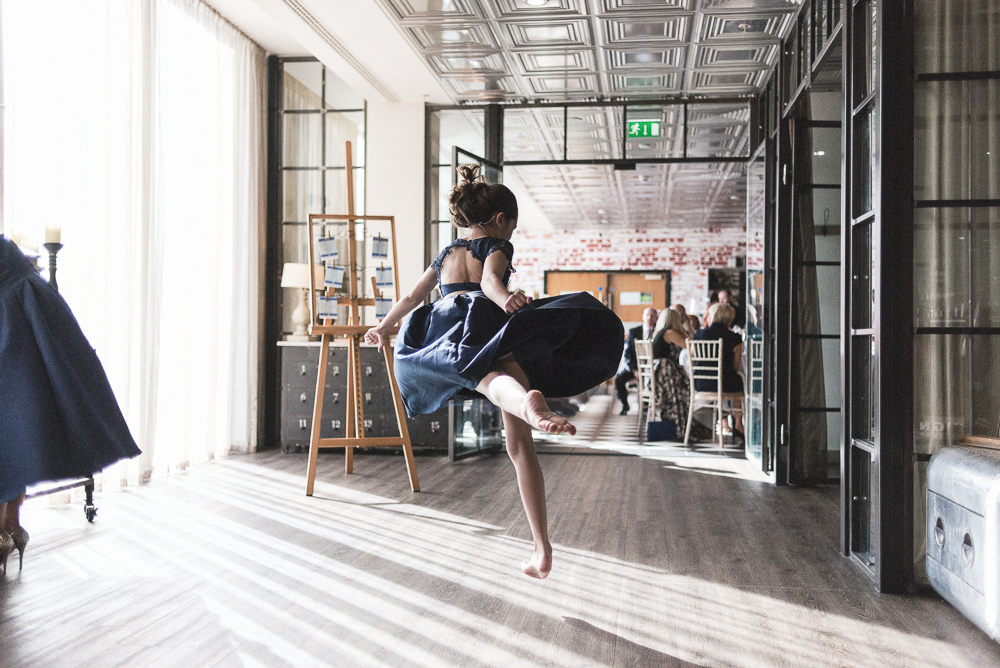 Girl dances ballet during a media city wedding. Wedding photography salford