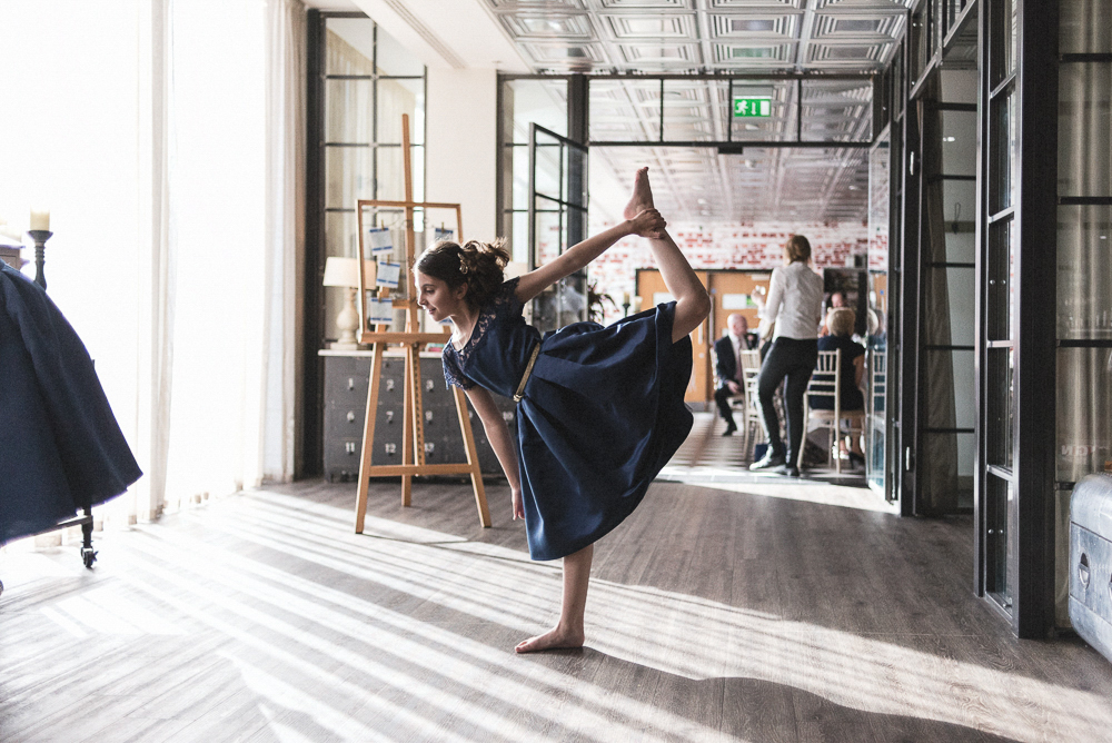 Girl dances ballet during a media city wedding. Wedding photography salford