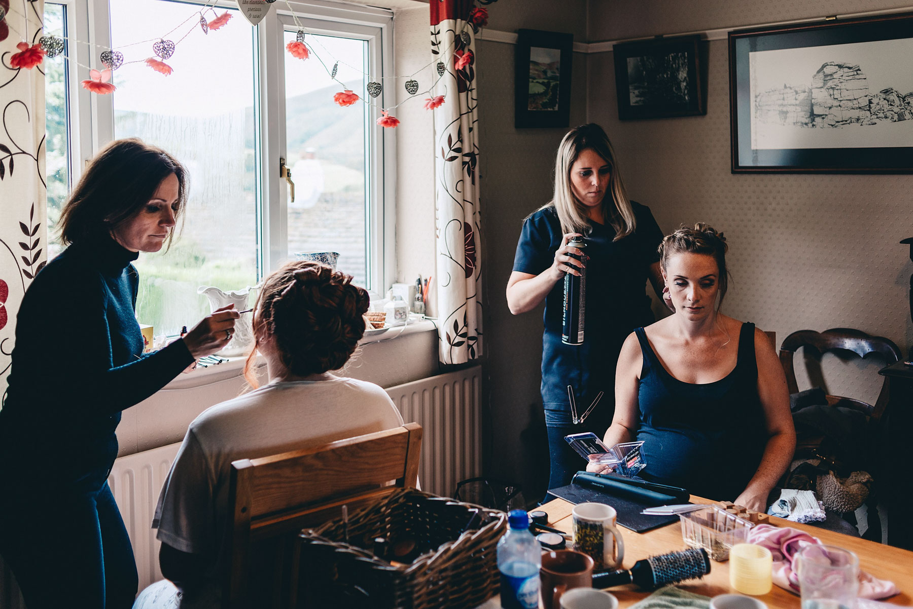 Bridesmaids getting ready in the morning