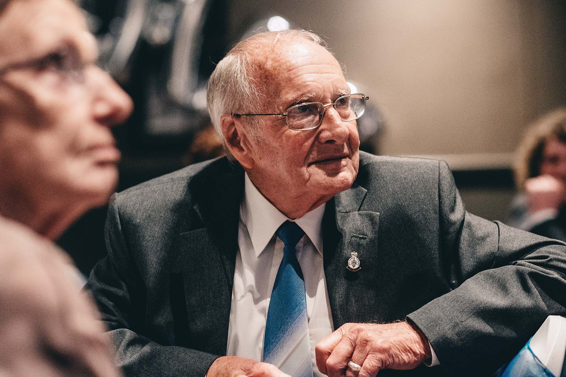 Grandad looks on with pride