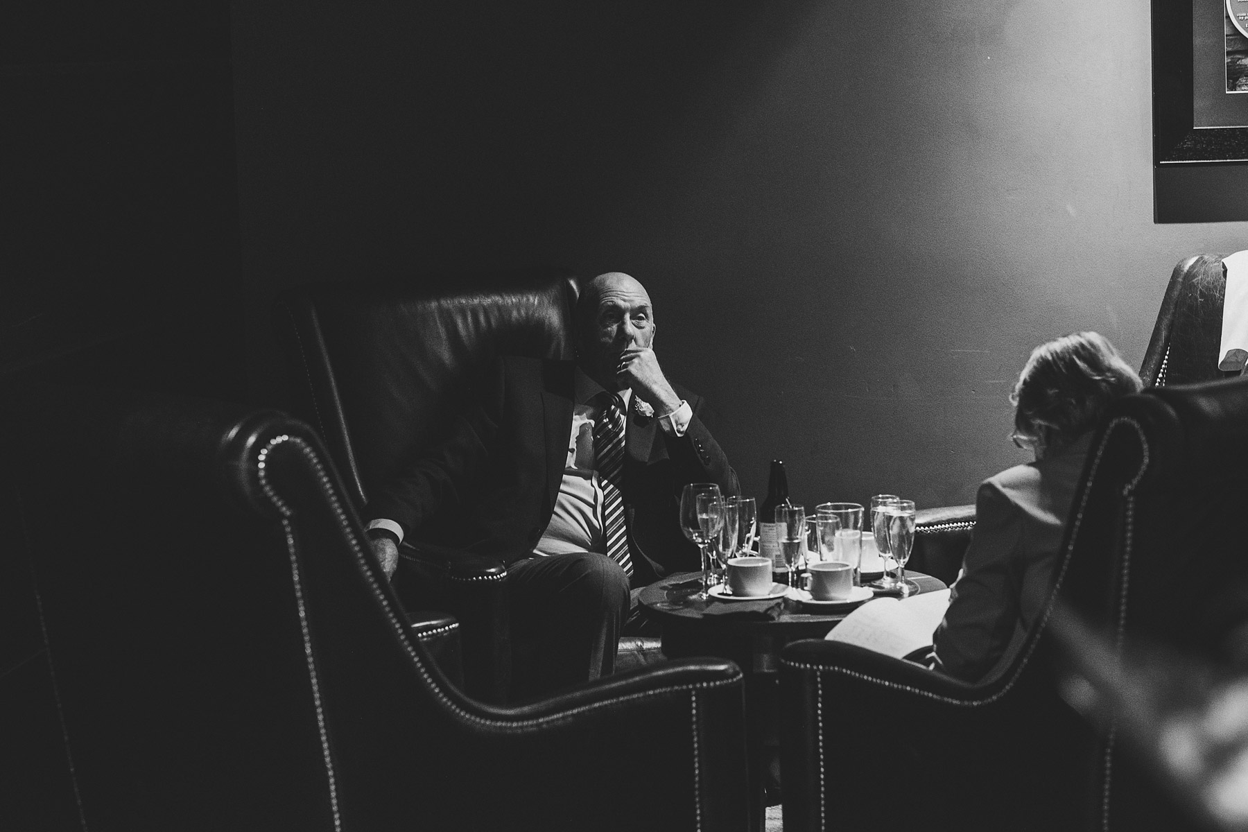 Black and white picture of guest during wedding