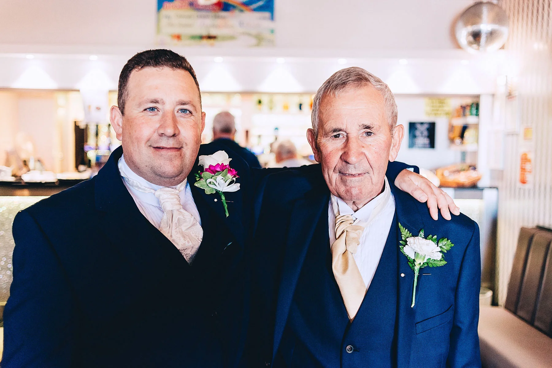 Father and son on sons wedding day