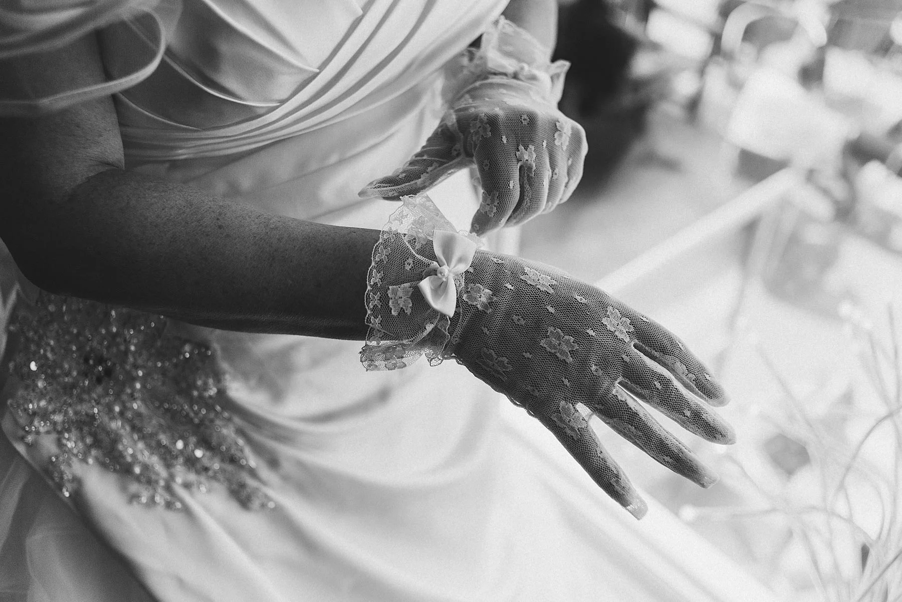 Bride puts on her gloves