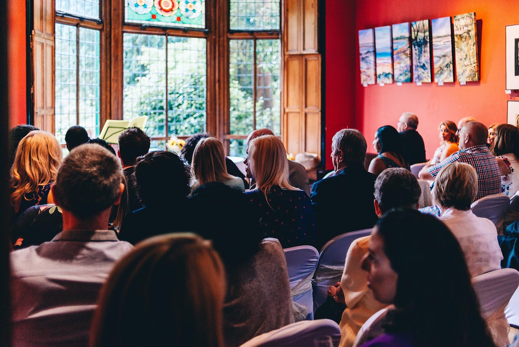 Guests wait inside venue for ceremony to start