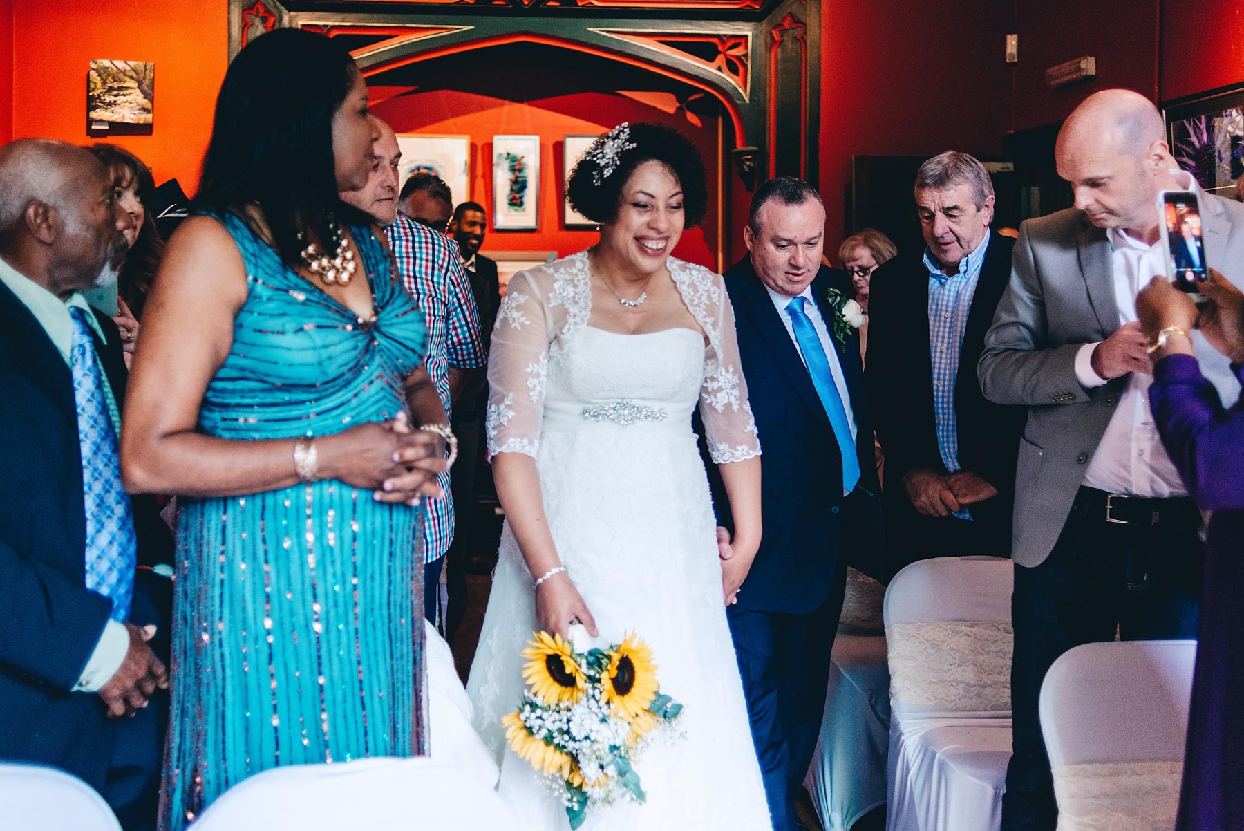 Couple walk up the aisle together