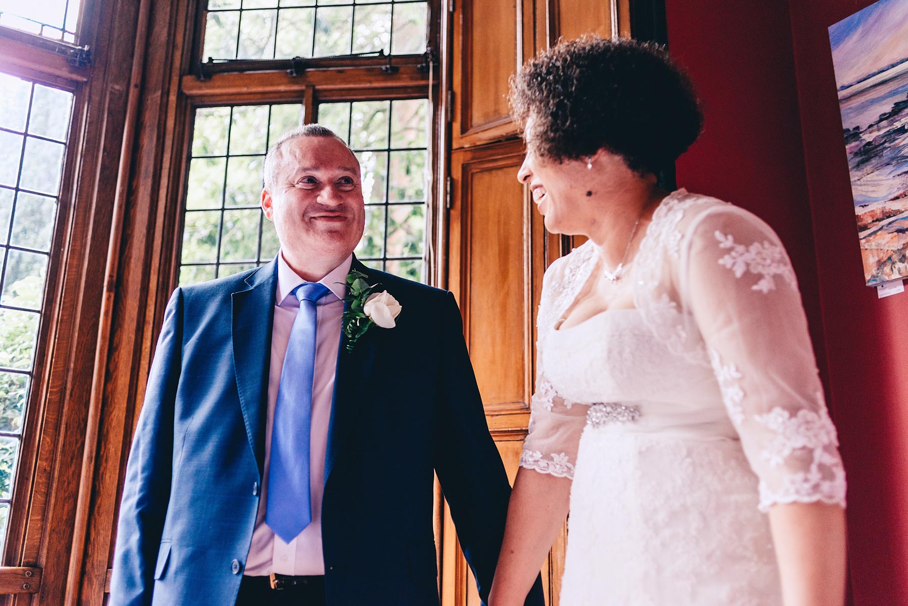 Bride and groom laugh together