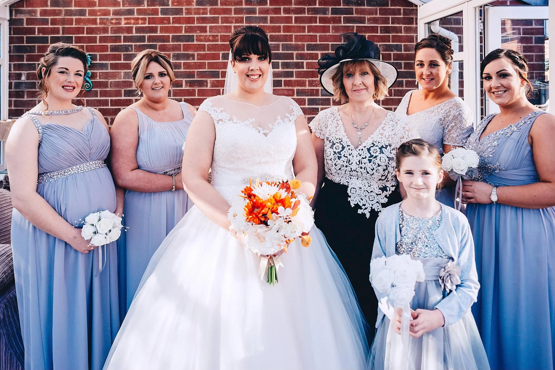 Wedding party pose for photo