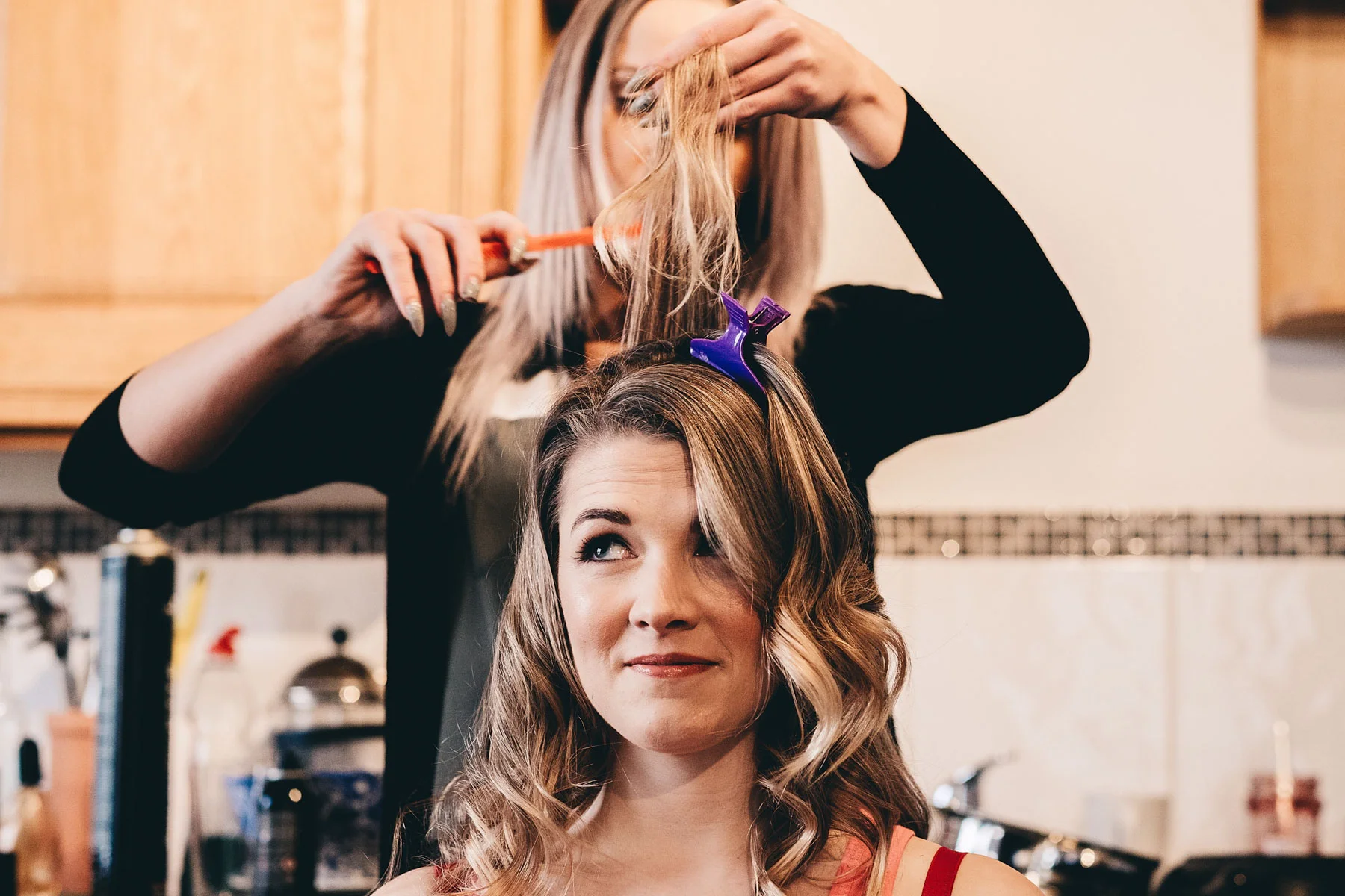 Bride having her hair made on the morning of the wedding