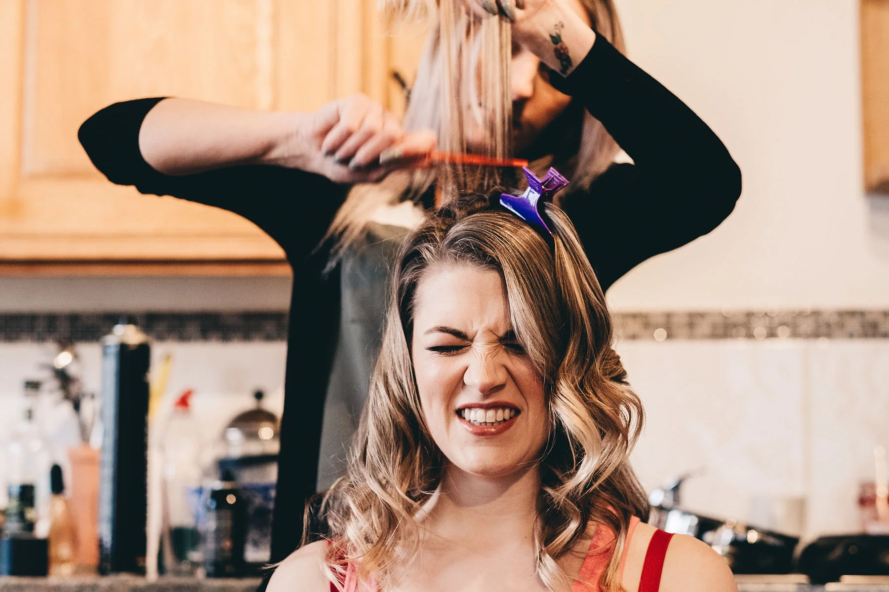 Bride having her hair made on the morning of the wedding