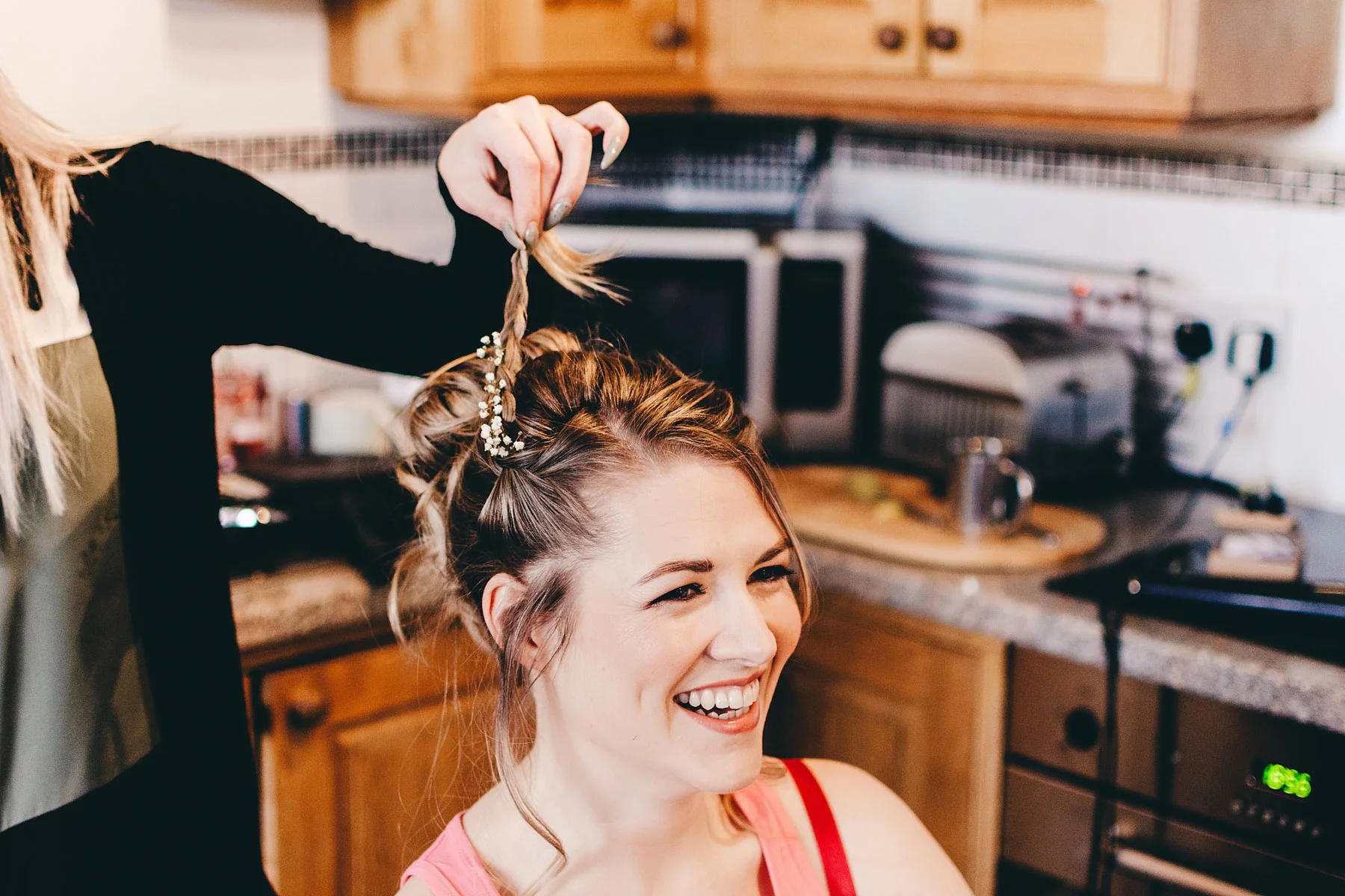 Bride having her hair made on the morning of the wedding