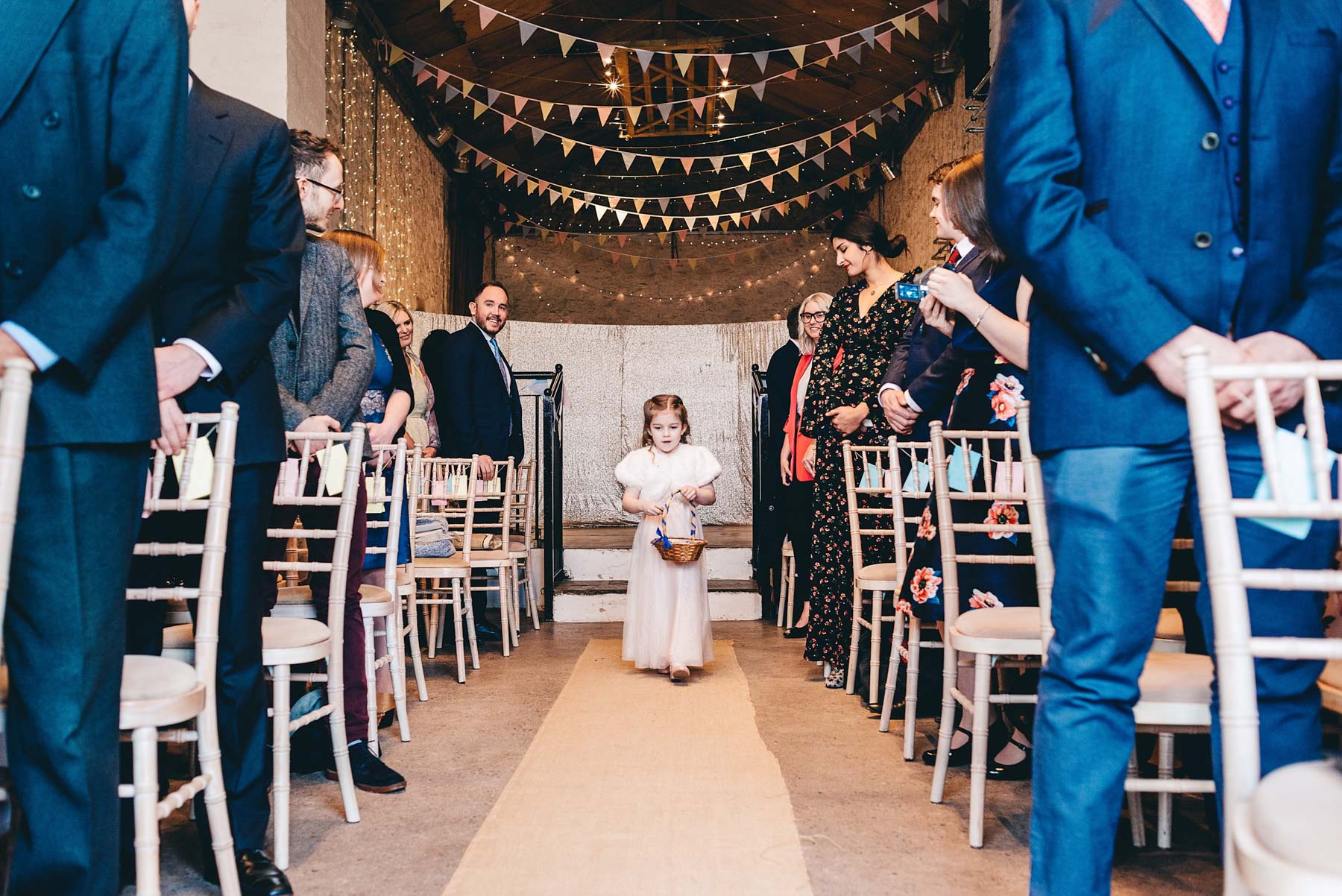 Bridesmaid walks down the aisle