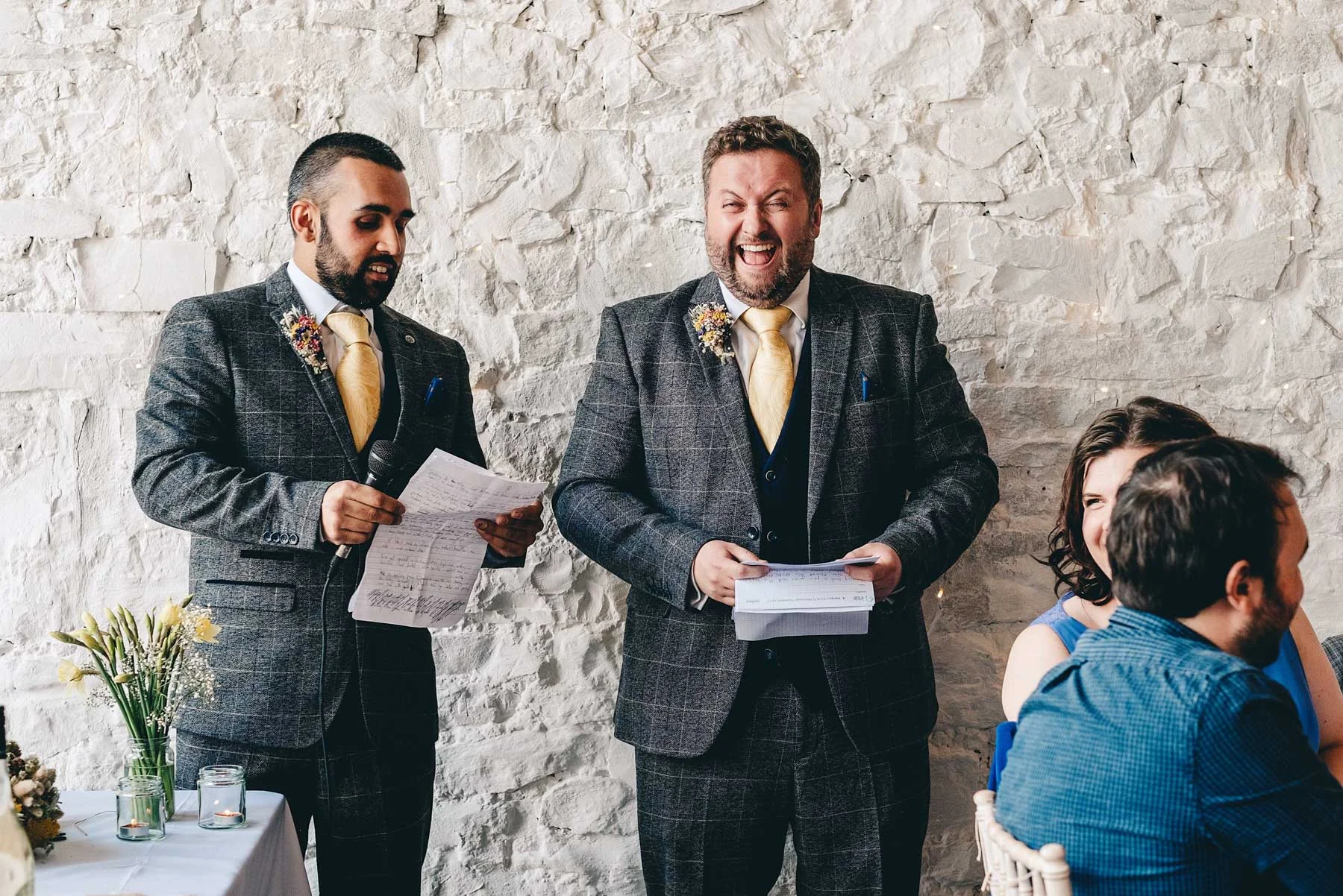 Best man laughs as he gives his speech at Rosedew Farm, Llantwit Major, South Wales