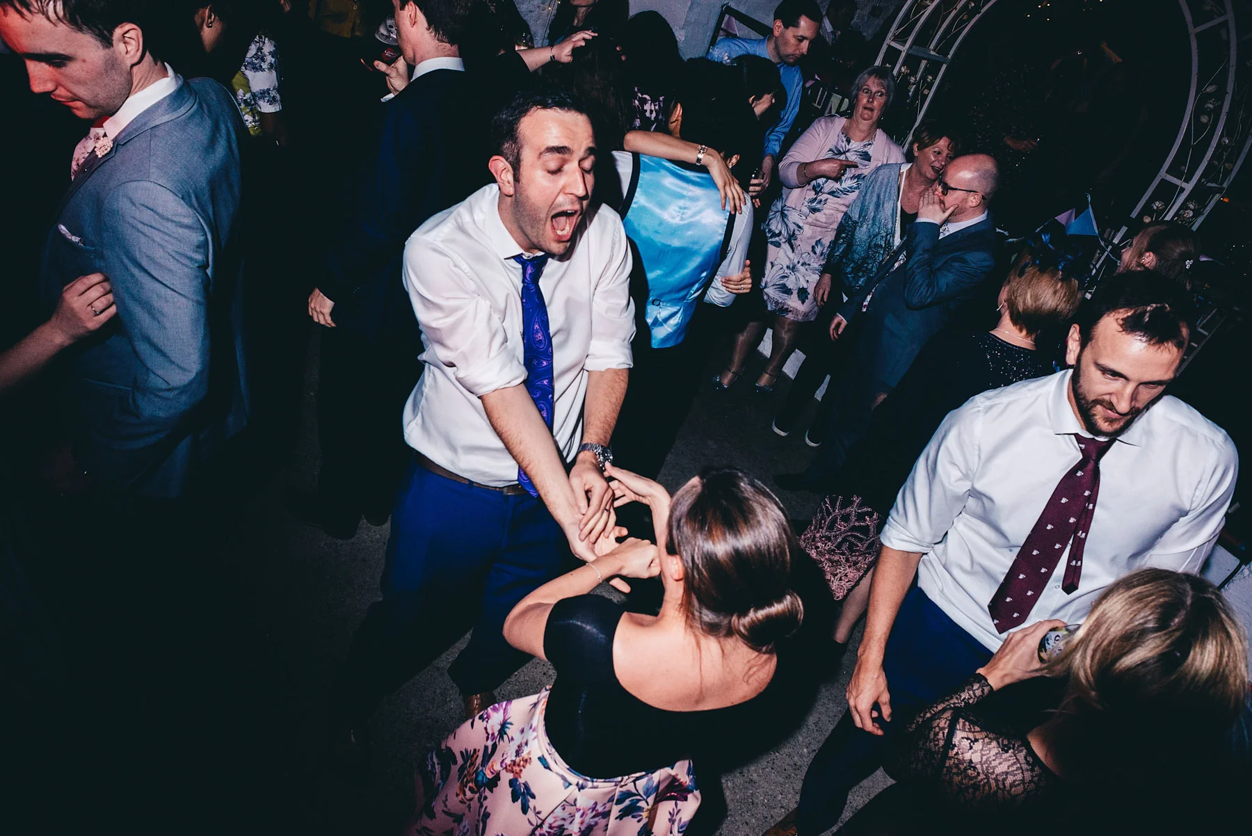 Guests dance at wedding