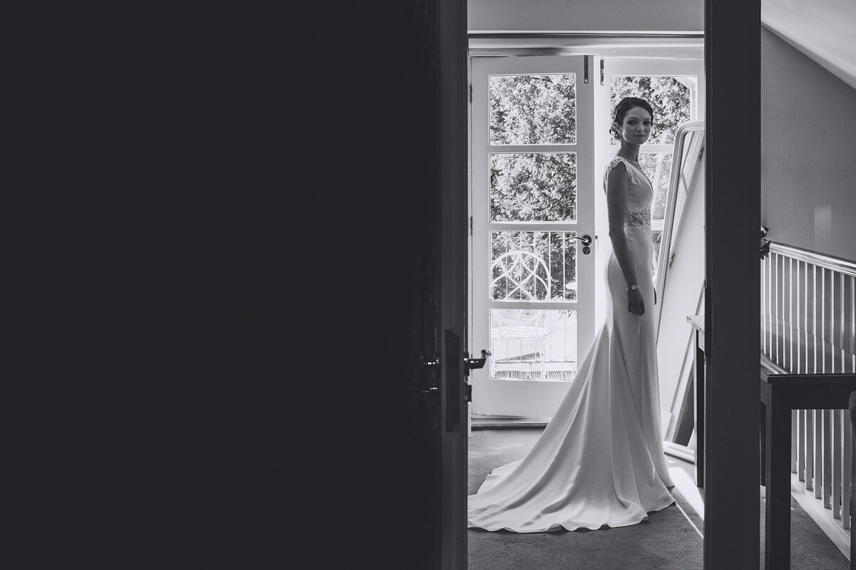 Bride looks elegant in the morning of her wedding