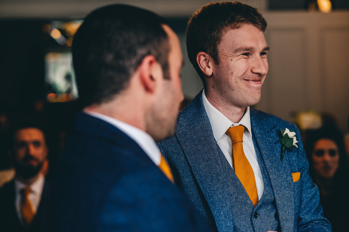 Best man smiles