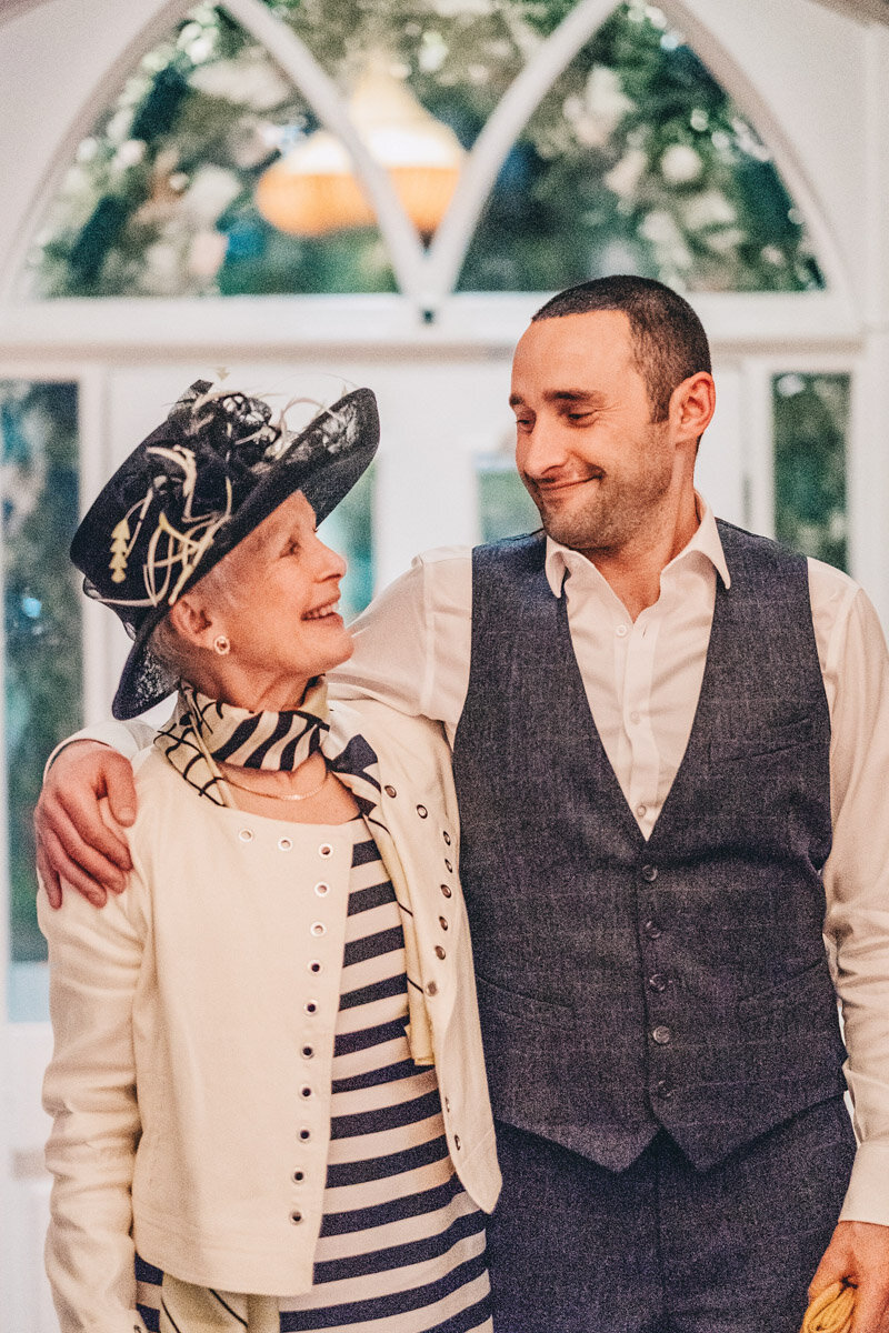 Groom hugs his mother