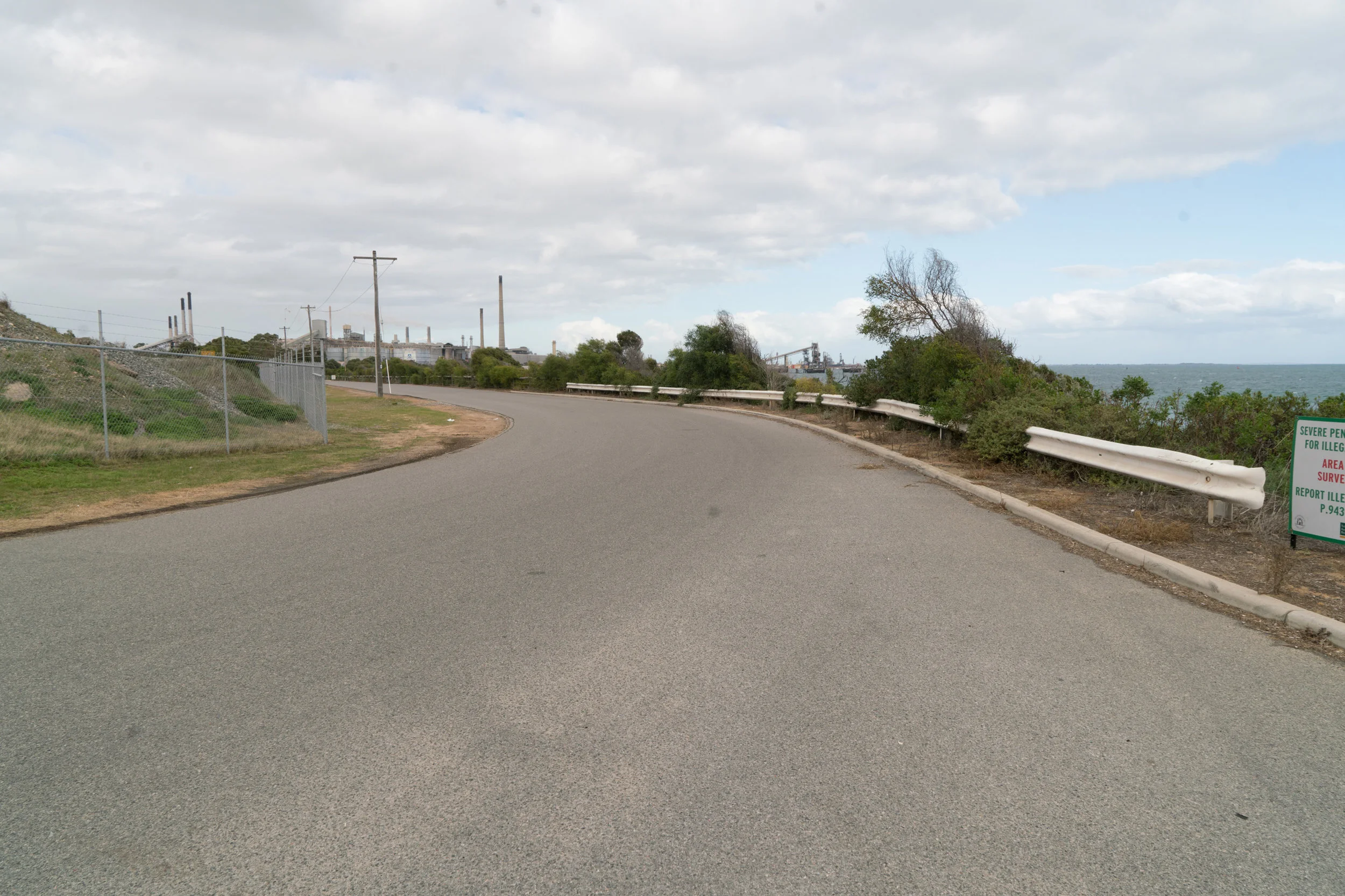 Plate 1: The road from the Naval Base Shacks south towards the industries and a small boat launching ramp (see Plate 2)