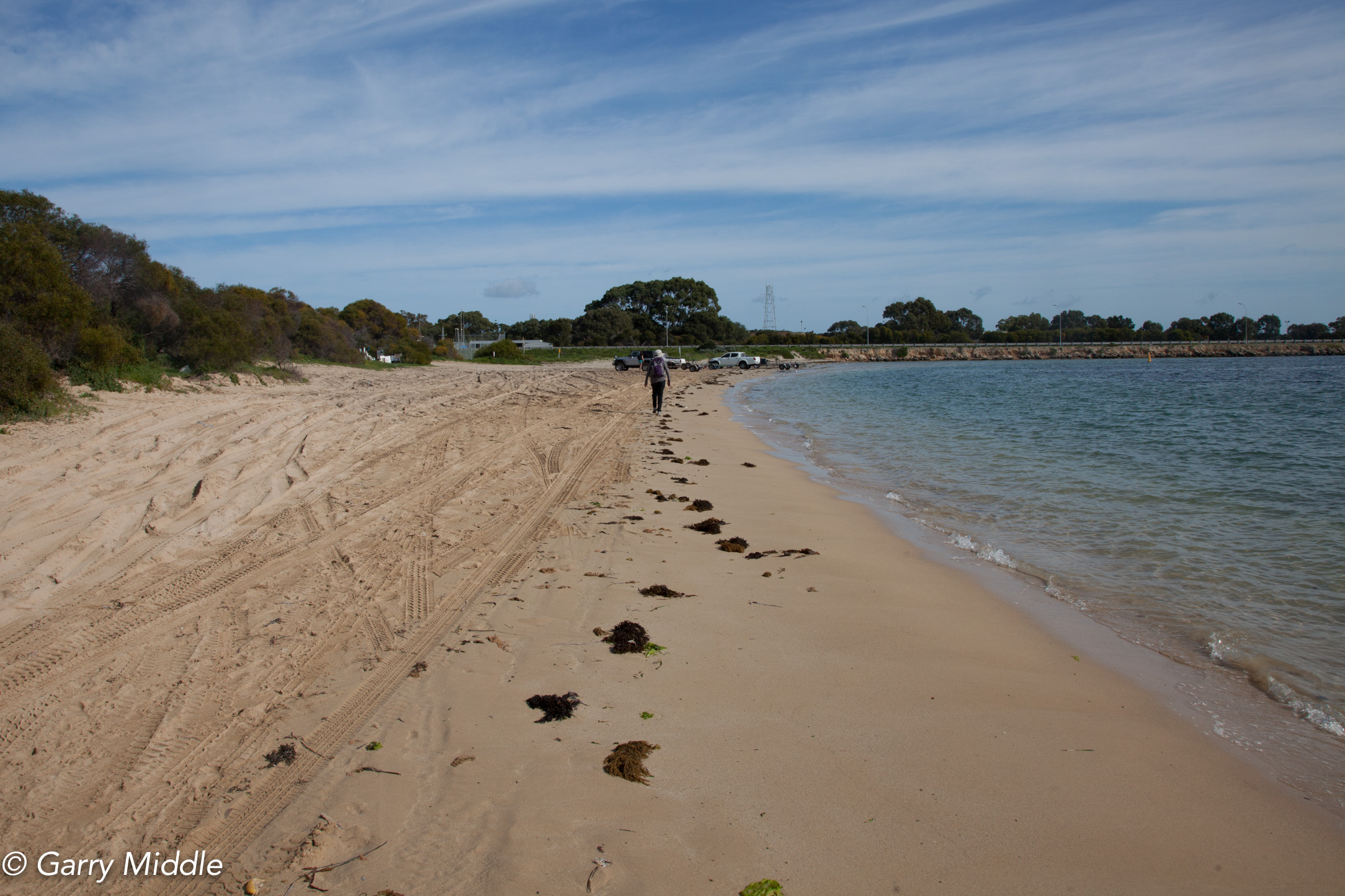 Plate 13: The beach walk passed the boat club with the Causeway just ahead.