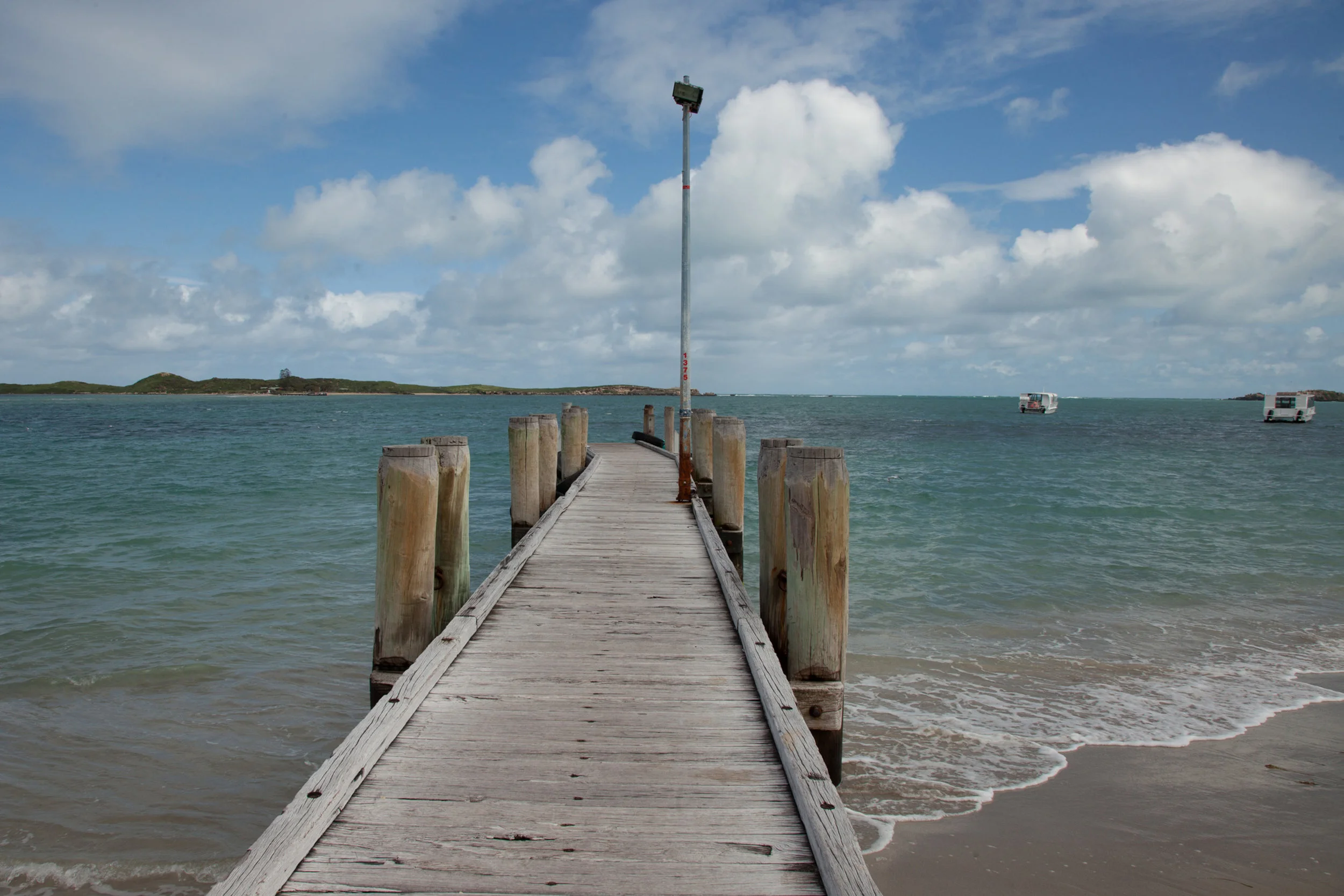 Plate 4: Ferry jetty at Mersey Point - the ferries visible in the background.