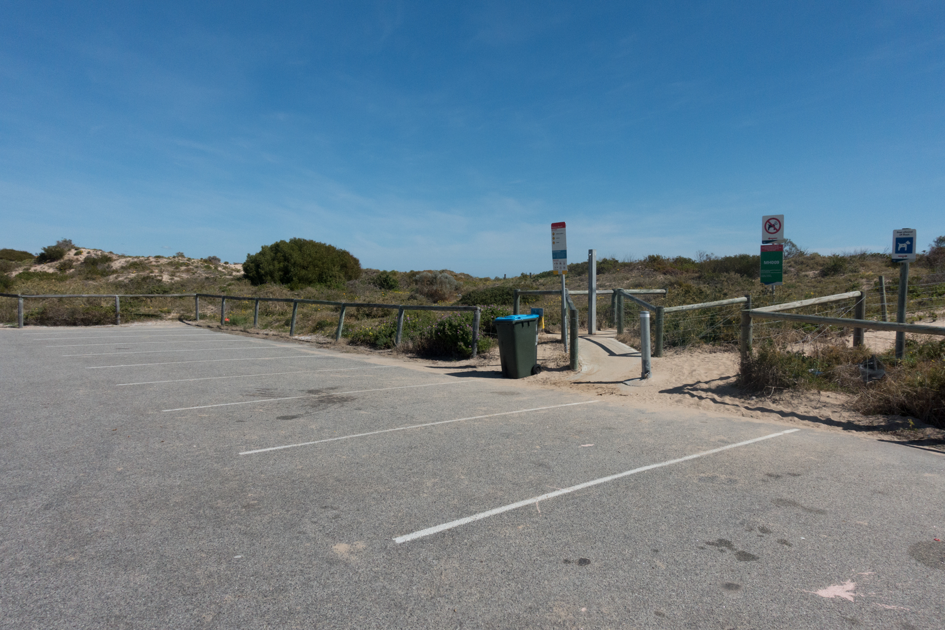 Plate 10: Small carpark at North Madora showing the track to the beac