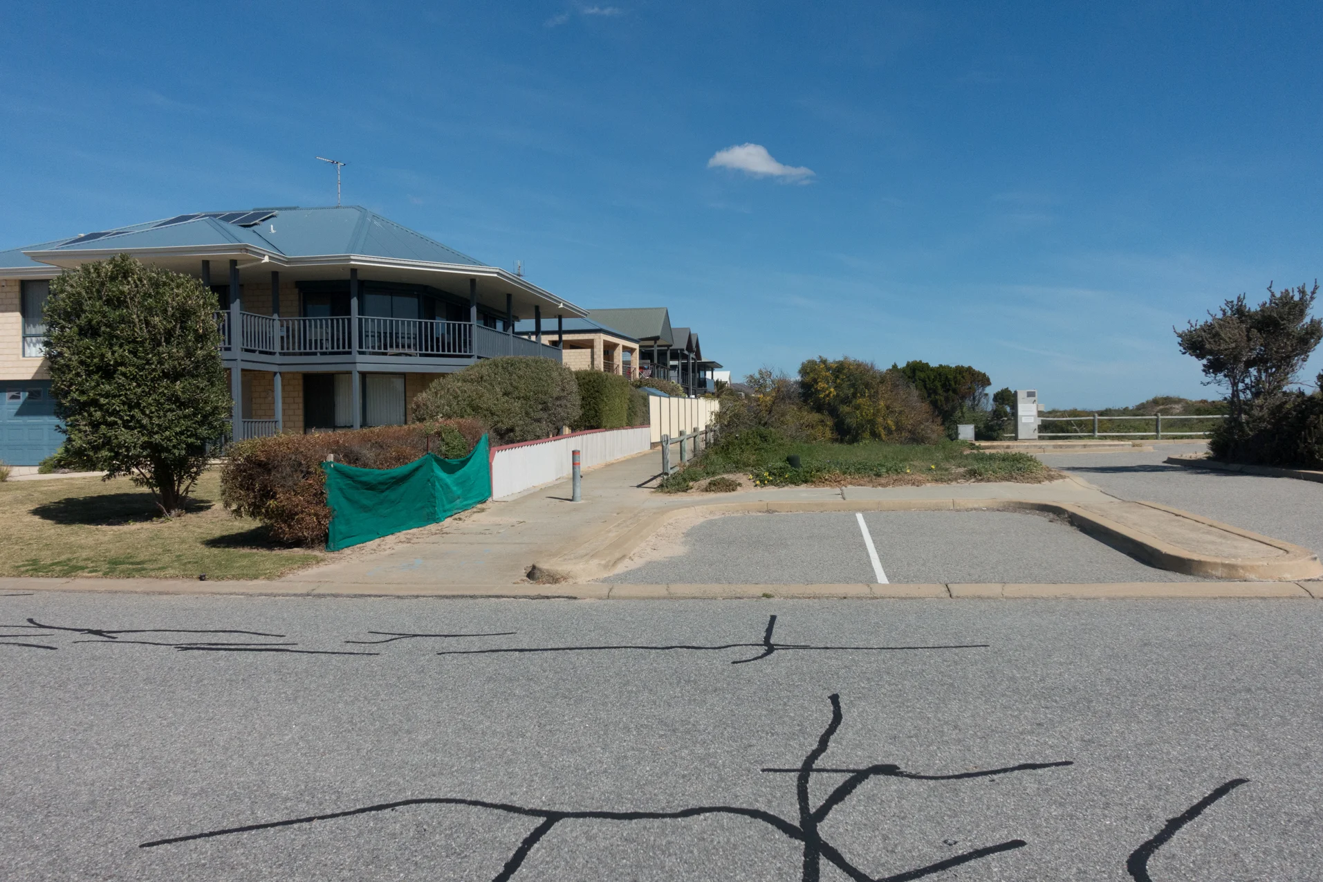 Plate 5: Start of path that runs in front of a row of houses