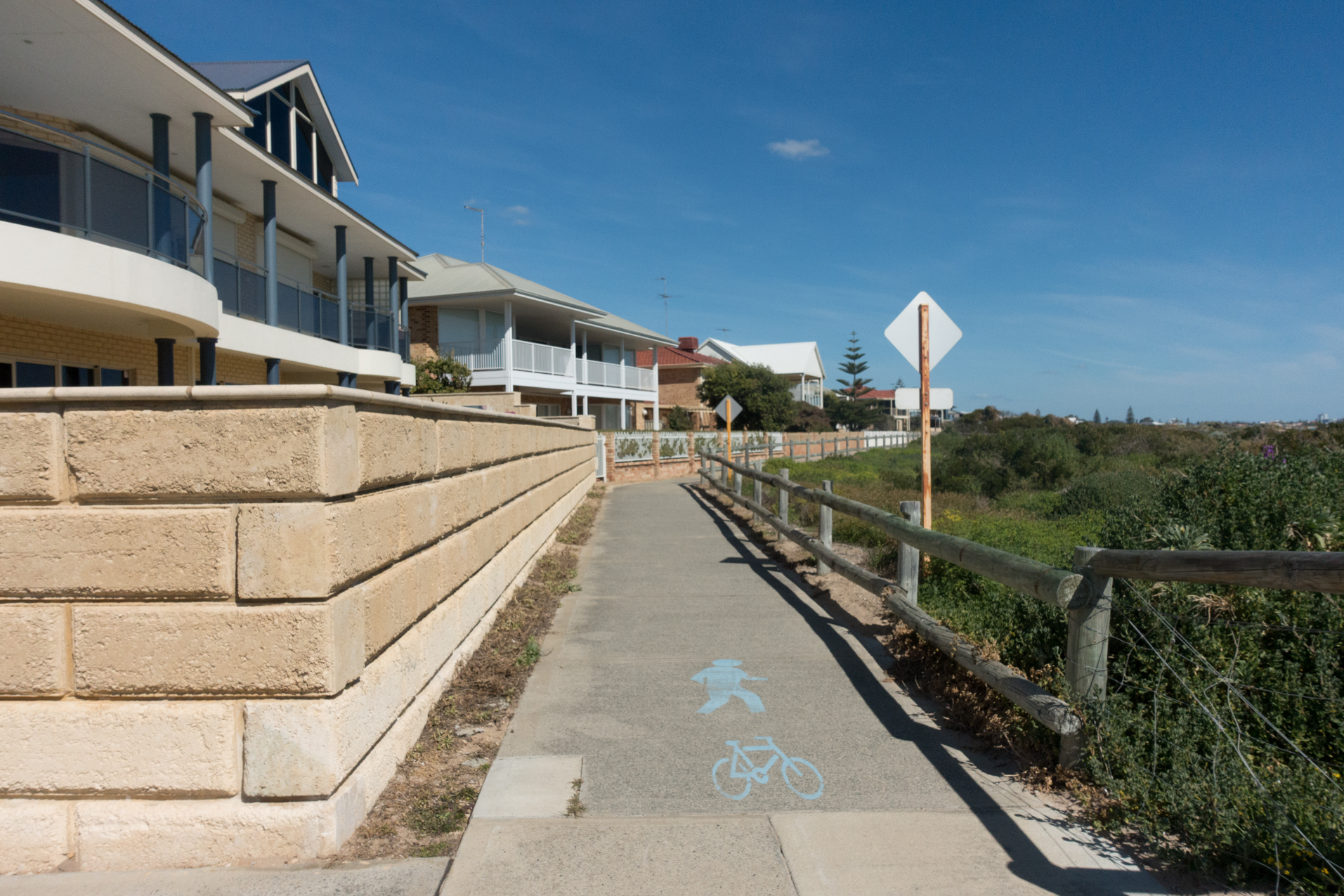 Plate 9: Second part of the path that runs in front of a row of houses