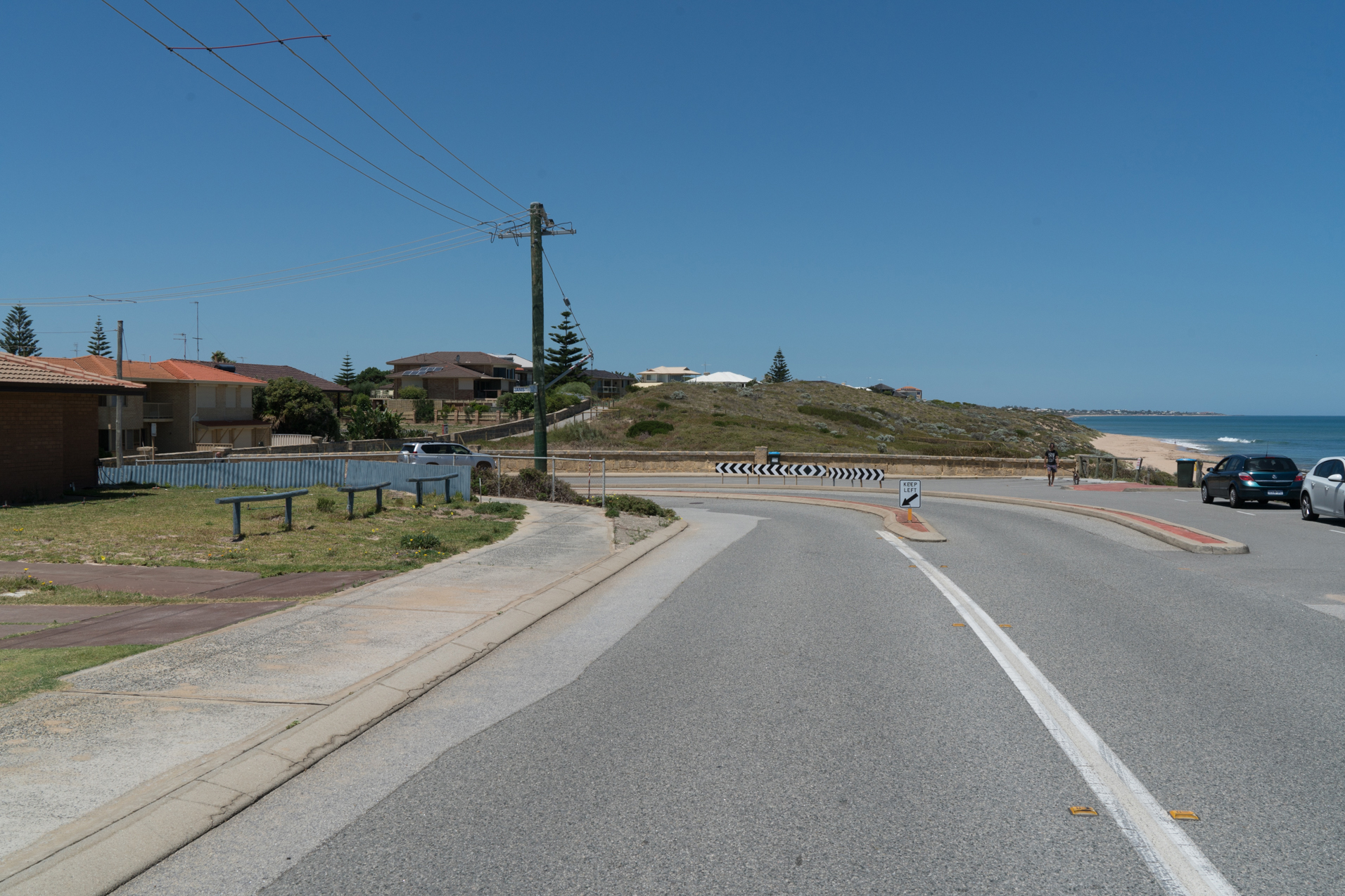 Plate 3: Start of coastal path running in front of row of houses at the end of Halls Head Parade