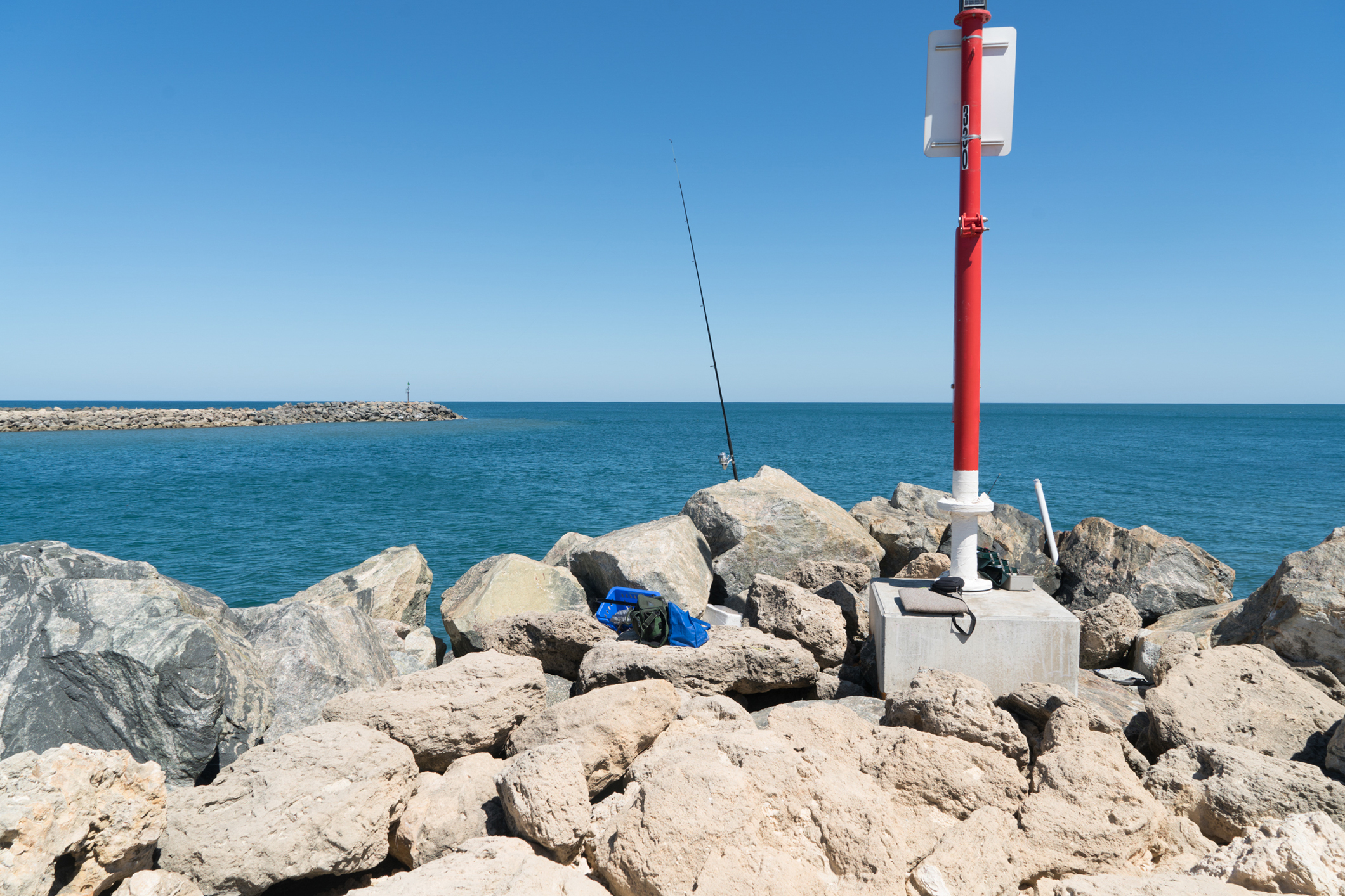 Plate 11: The view from the end of the rock groyne at the mouth of the Dawesville Channel
