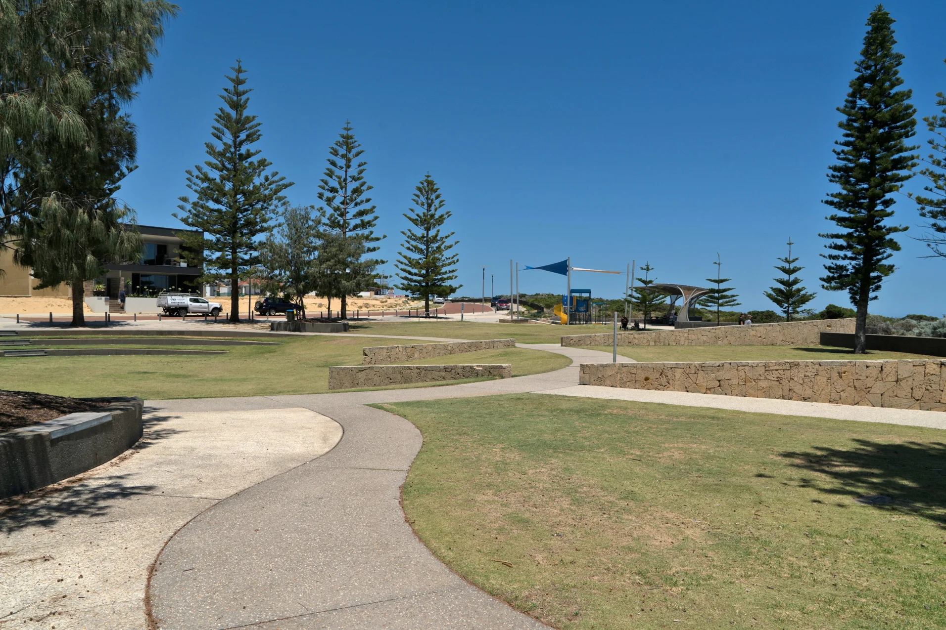 Plate 2: Small coastal node with park, new apartments and small shopping area with cafe