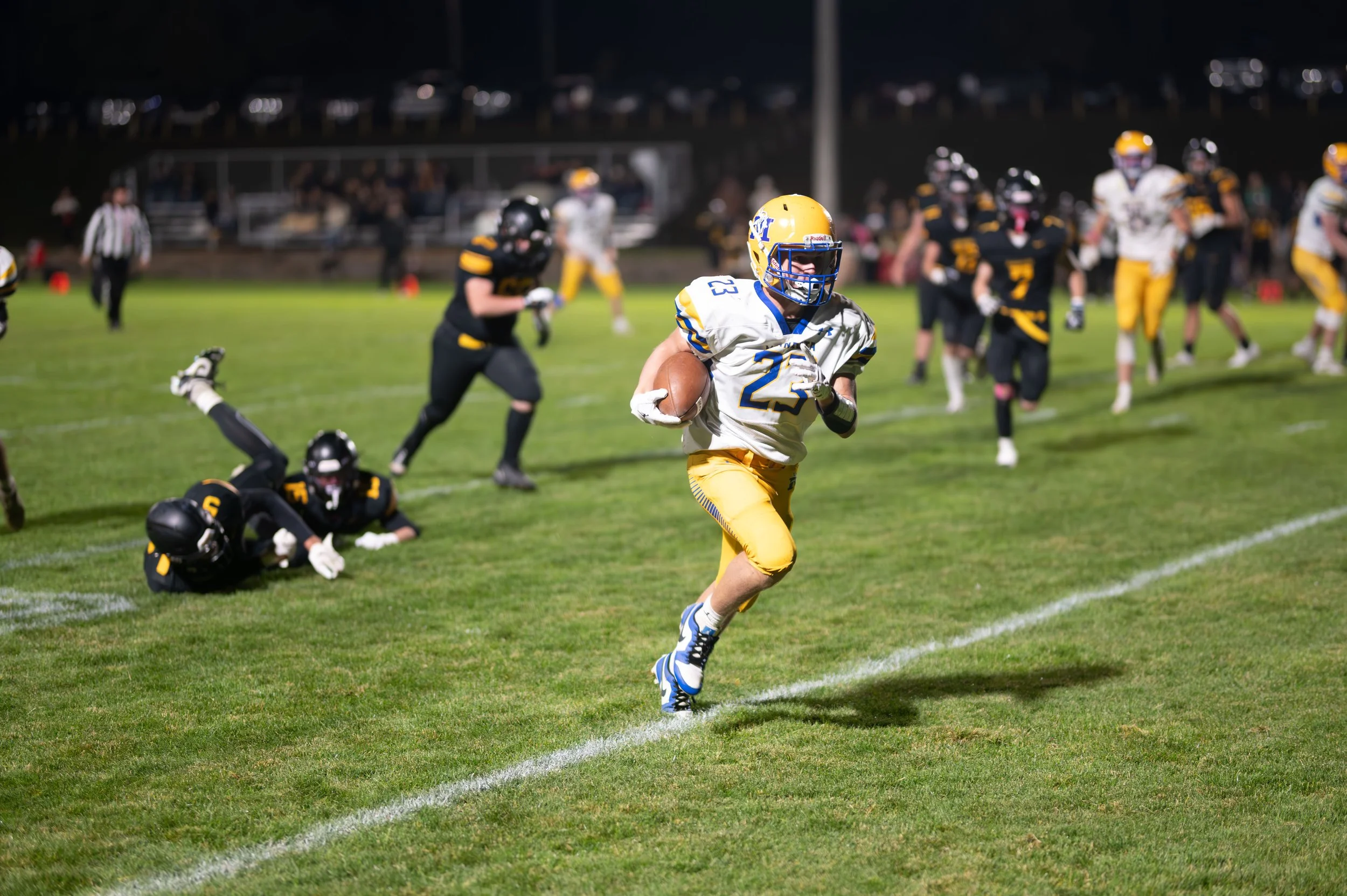 Destin Fier pulls away for one of his three touchdowns on the night..JPG